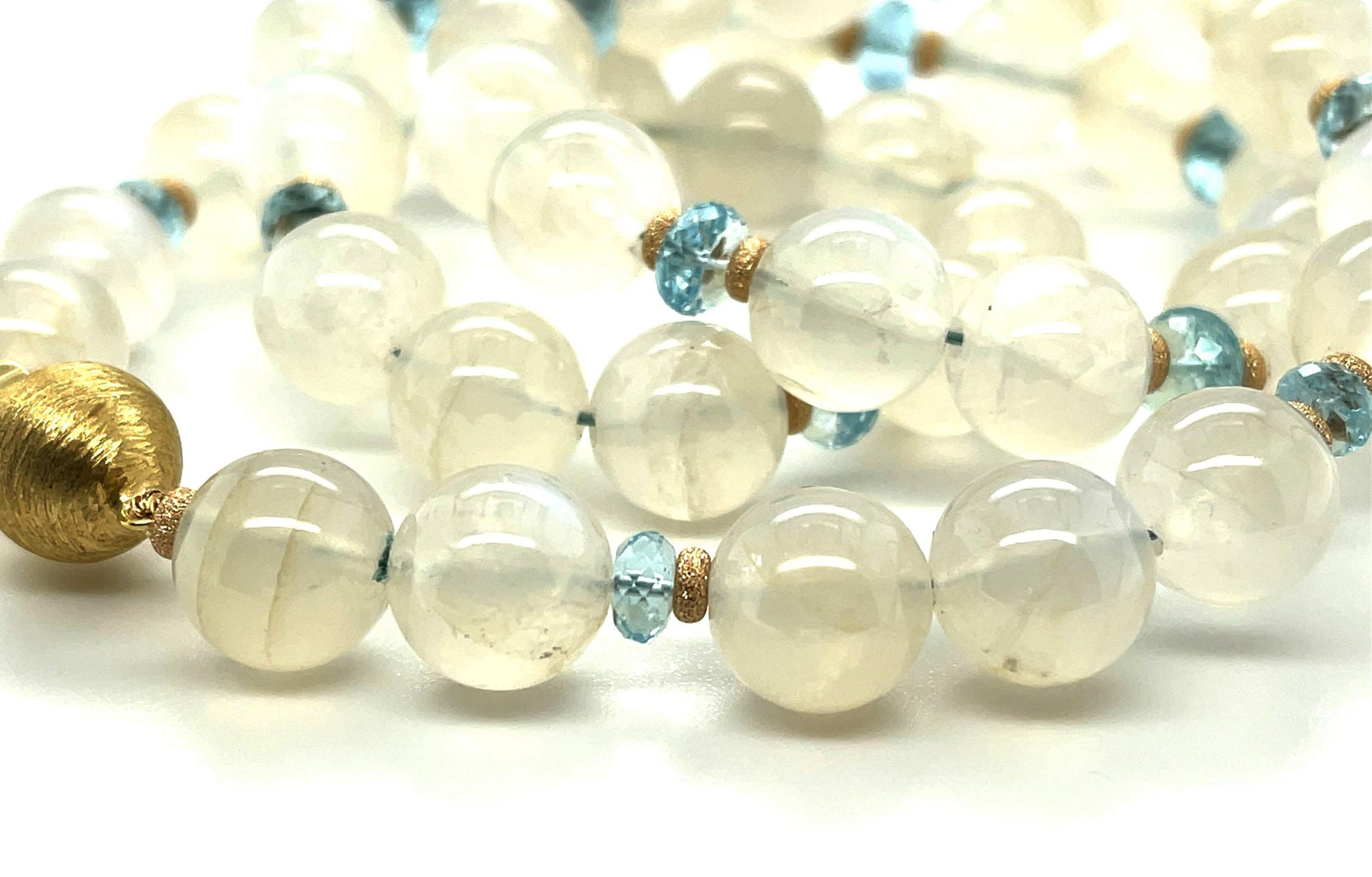This gorgeous moonstone and faceted aquamarine beaded necklace is so elegant and versatile! Sparkling sky blue aquamarine beads bring out the lovely 
