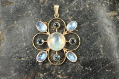 Moonstone and Blue Sapphire Floral Pendant