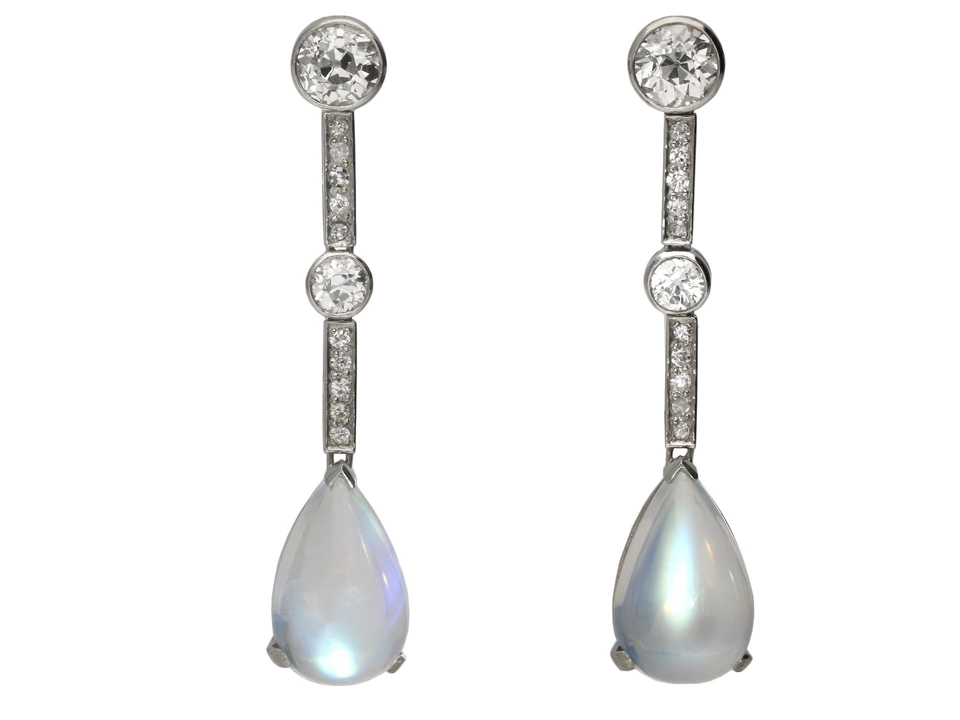 Cabochon Moonstone and diamond drop earrings, circa 1930. For Sale