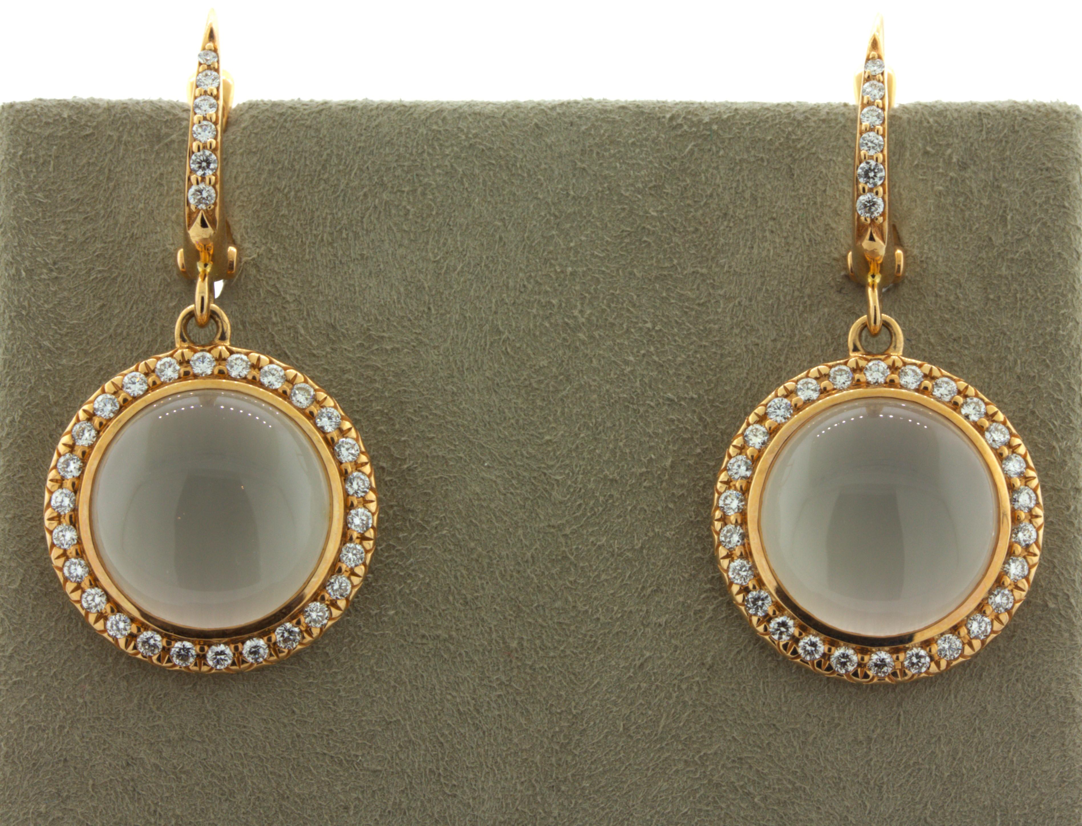Moonstone Diamond 18k Rose Gold Drop Earrings

A sweet and stylish pair of rose gold moonstone earrings! They feature 2 cabochon moonstones weighing approximately 6 carats with a fine polish and white glow. They are surrounded by 1.08 carats of