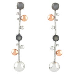 Boucles d'oreilles pendantes en or blanc 14k avec pierres de lune et diamants