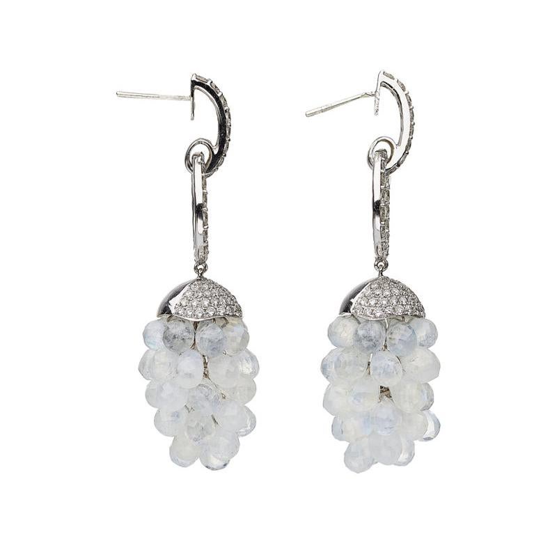 Playful and fun! A chandelier of briolette cut moonstones drop from this one of a kind design. There are 3.64 carats of brilliant cut diamonds set in these 18K white gold post back earrings. The moonstones show flashes of blue as the earrings