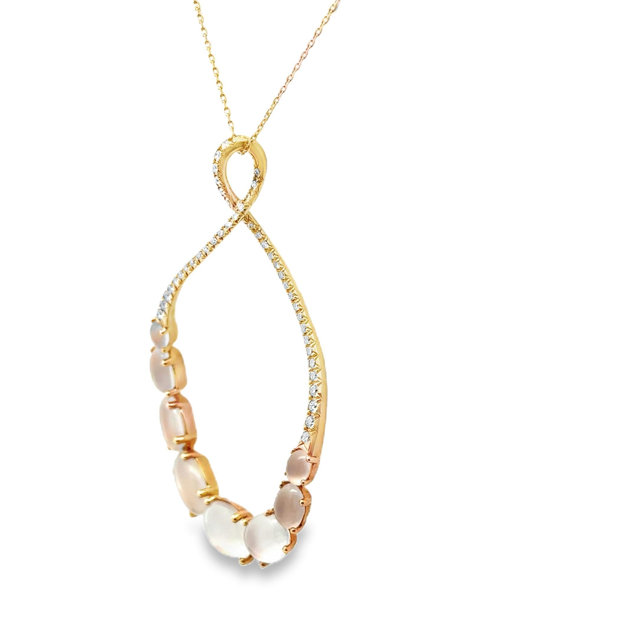 This elegant pendant necklace features a captivating 8.52 carats of cabochon-cut moonstone, exuding a soft white glow. The pendant is meticulously crafted in 18k gold, with accents of rose gold adding warmth to the design. Surrounding the moonstone