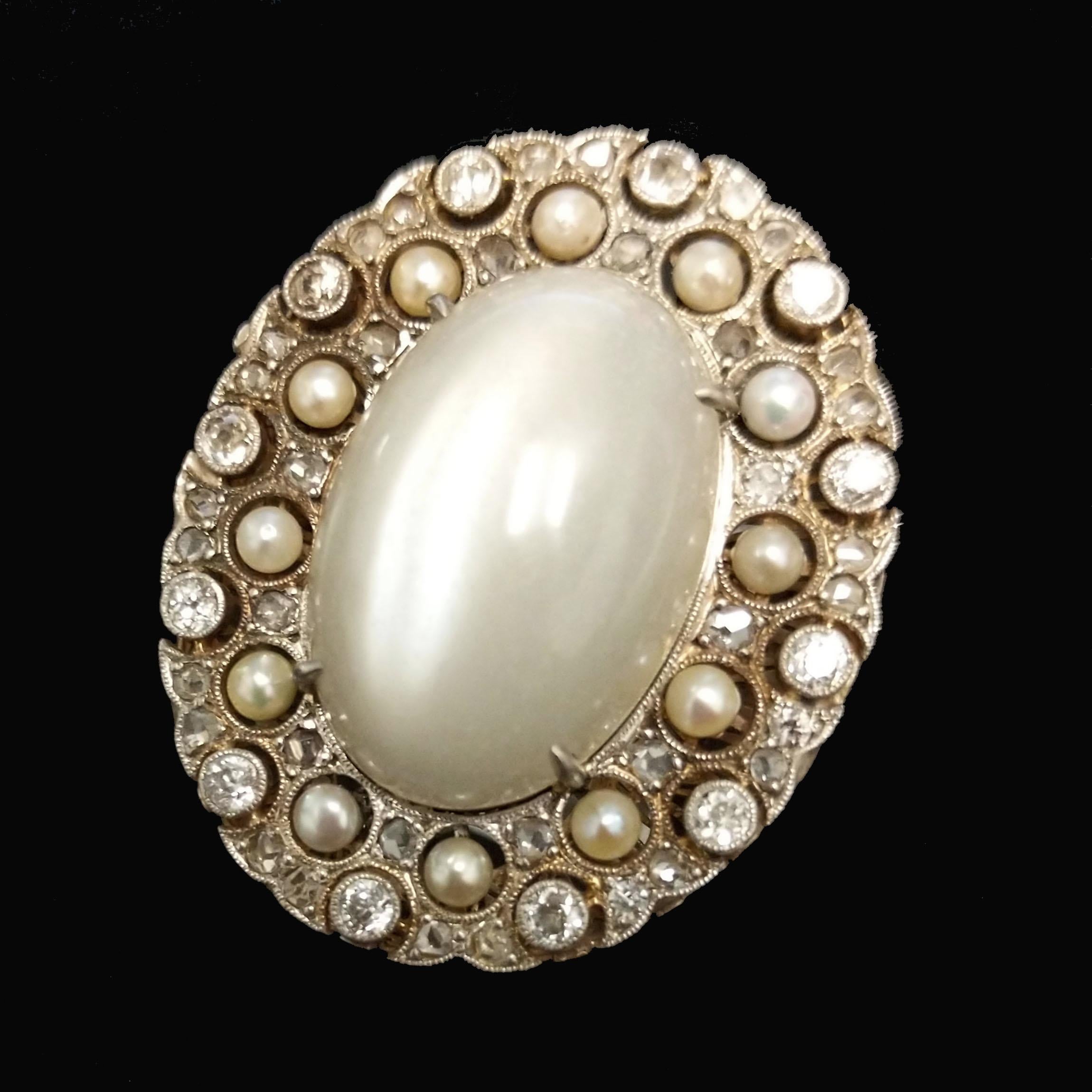Moonstone, Diamond, Pearl, and Platinum Ring In Good Condition In New York, NY
