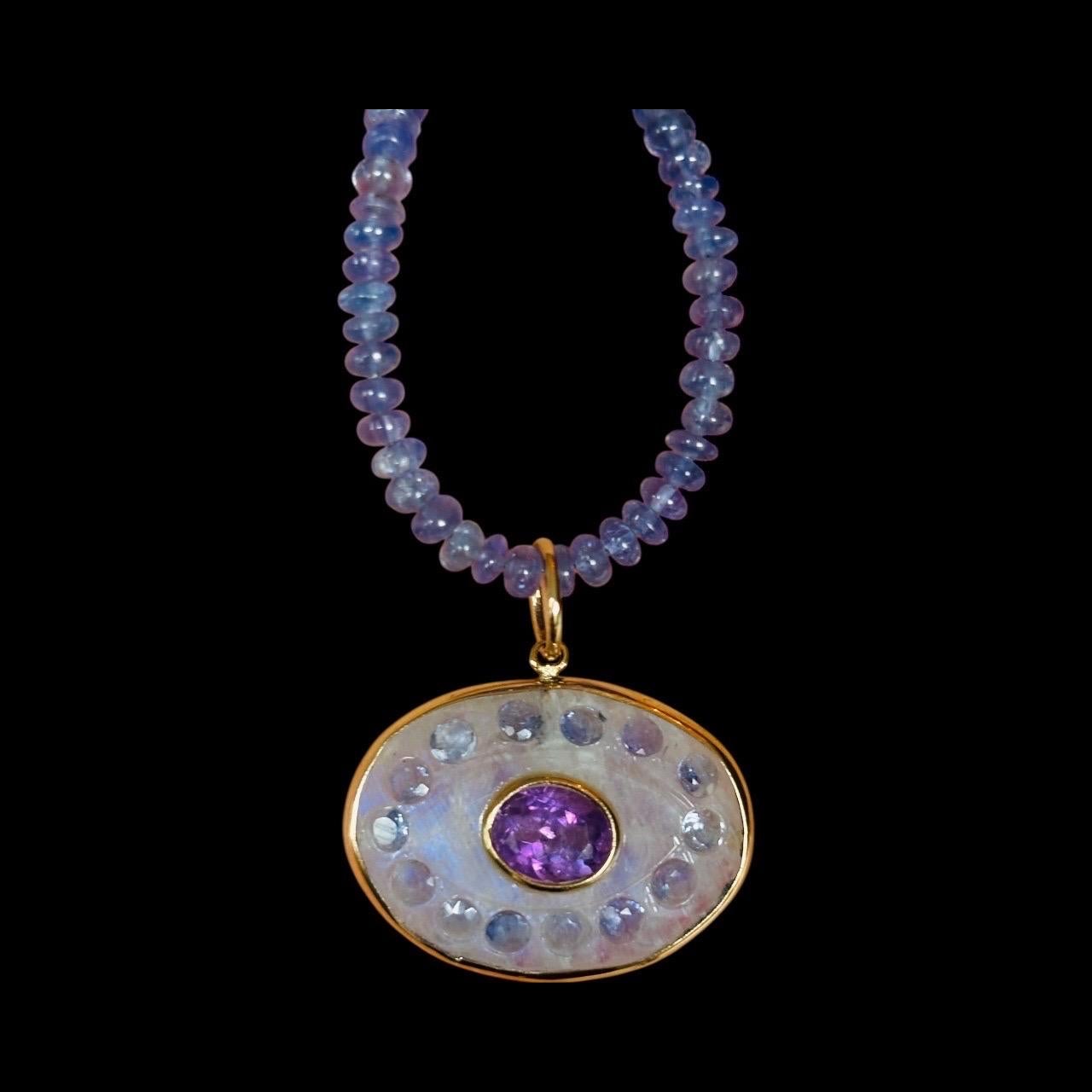 Collana con il malocchio

Pietra di luna bianca, tanzanite, ametista e oro 14k

Collana unica nel suo genere

malocchio in pietra di luna intagliato a mano (1