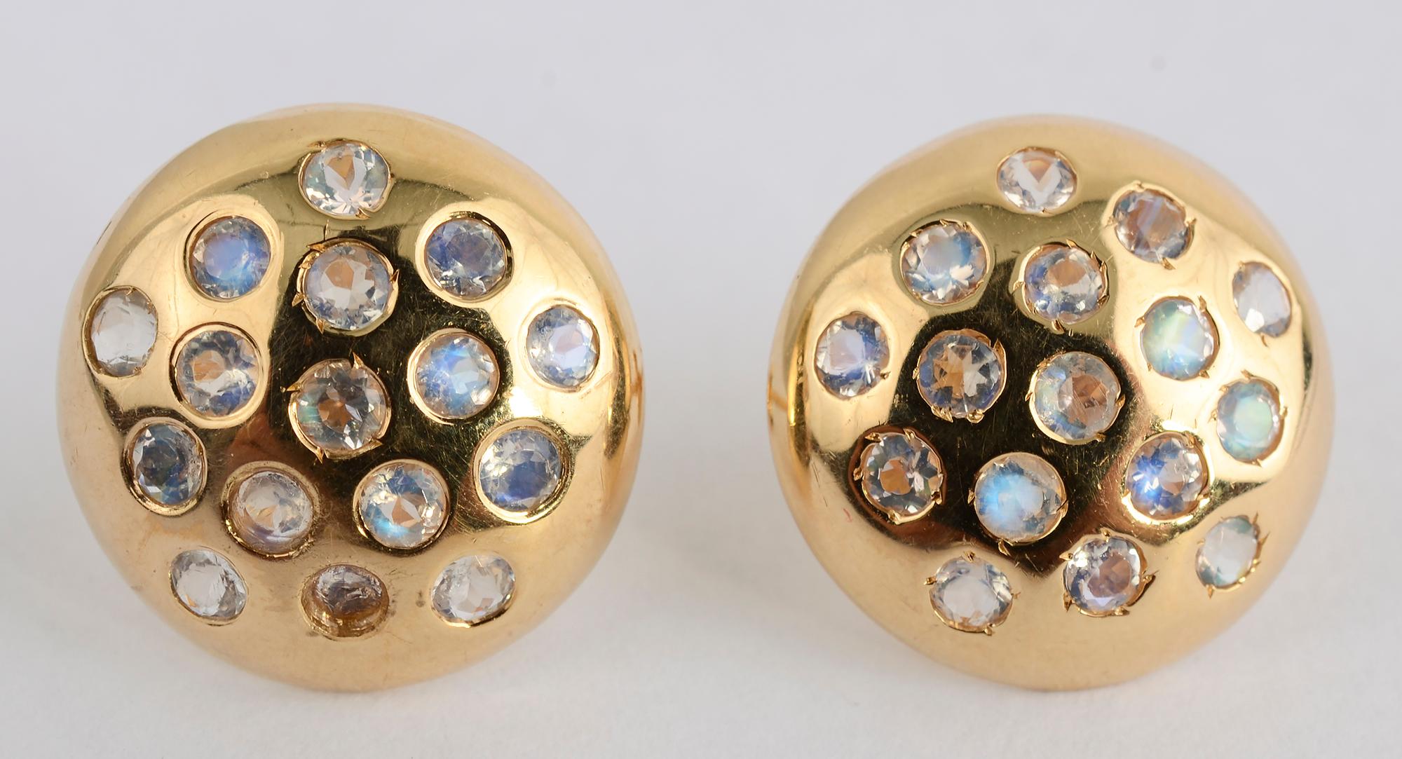 Eighteen karat button earrings, each with 16 moonstones. Made by the Spanish firm, Tous. Backs are posts.