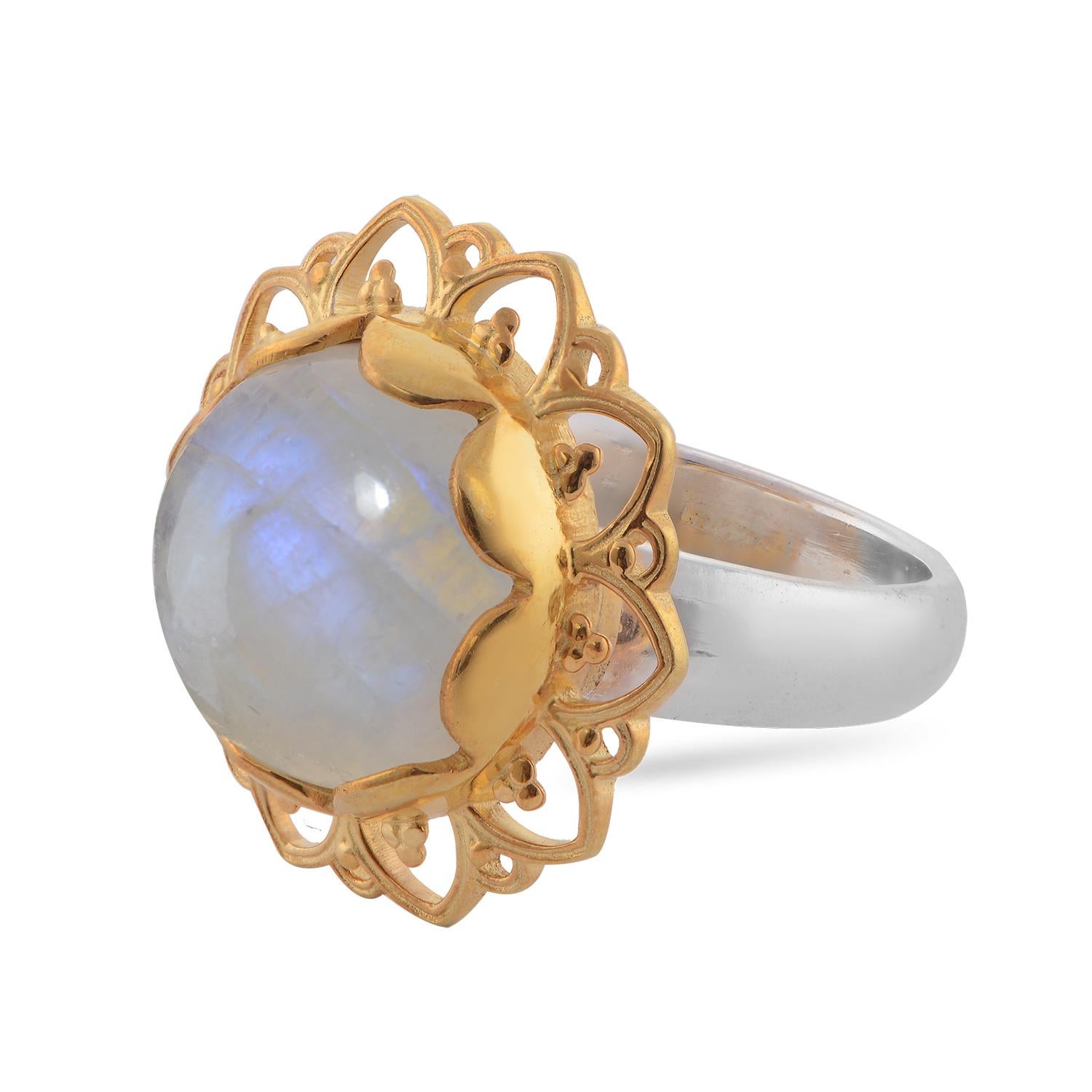 

This gorgeous ring has been handmade in our workshops. We have used jaali and embossed work and embedded it with a rainbow moonstone. It has matching earrings, pendant and bracelet. It is made in sterling silver with 24ct gold vermeil.

Ring