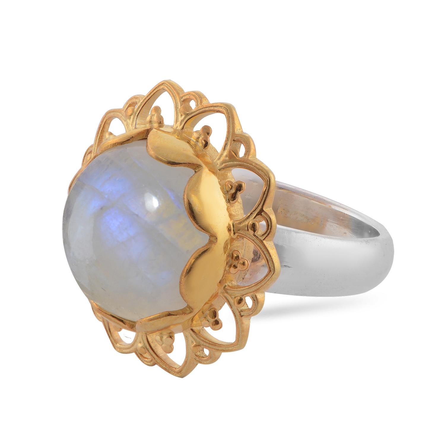 

This gorgeous moonstone ring has been handmade in our workshops. We have used jaali and embossed work and embedded it with a rainbow moonstone. It has matching earrings, pendant and bracelet. It is made in sterling silver with 24ct gold
