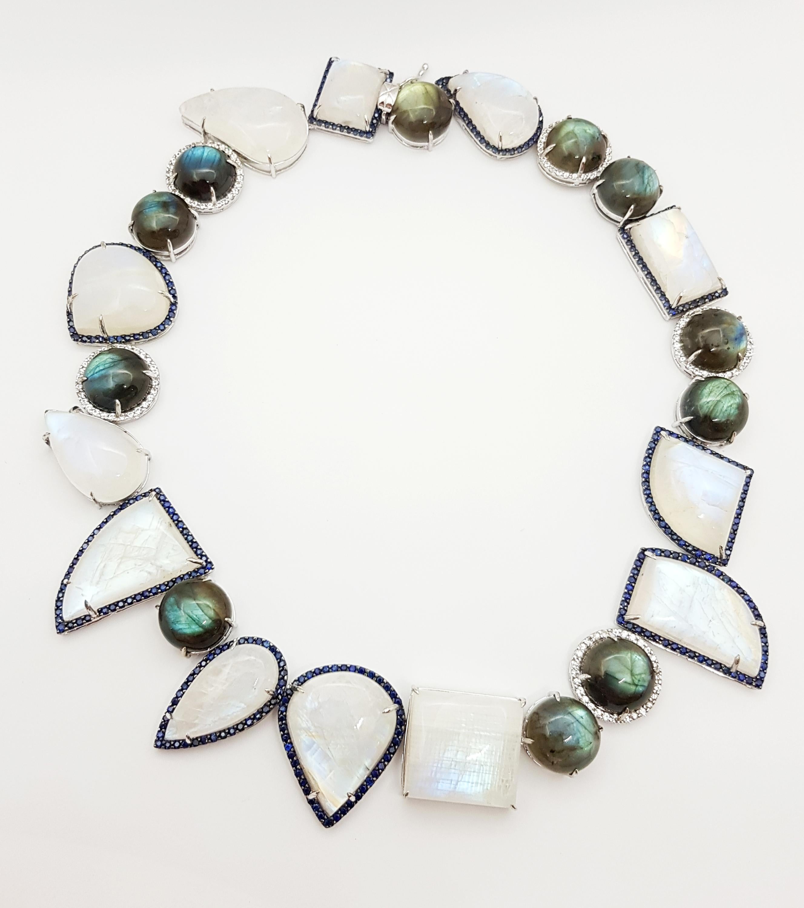 Moonstone , Labradorite, Blue Sapphire and White Sapphire Necklace set in Silver Settings

Width:  3.3 cm 
Length:  44.5 cm
Total Weight: 147.39 grams

*Please note that the silver setting is plated with rhodium to promote shine and help prevent