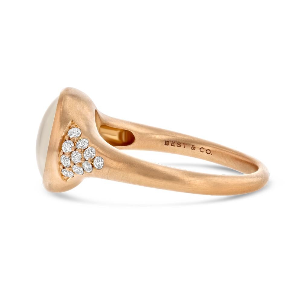 Our Moonstone Matte Gold Ring is a gorgeous modern piece. With a bezel set moonstone hugged by two triangles of 10 diamonds each, and a matte rose gold band there is nothing quite like it.

(18k rose gold, 20 white diamonds, and 1 moonstone)