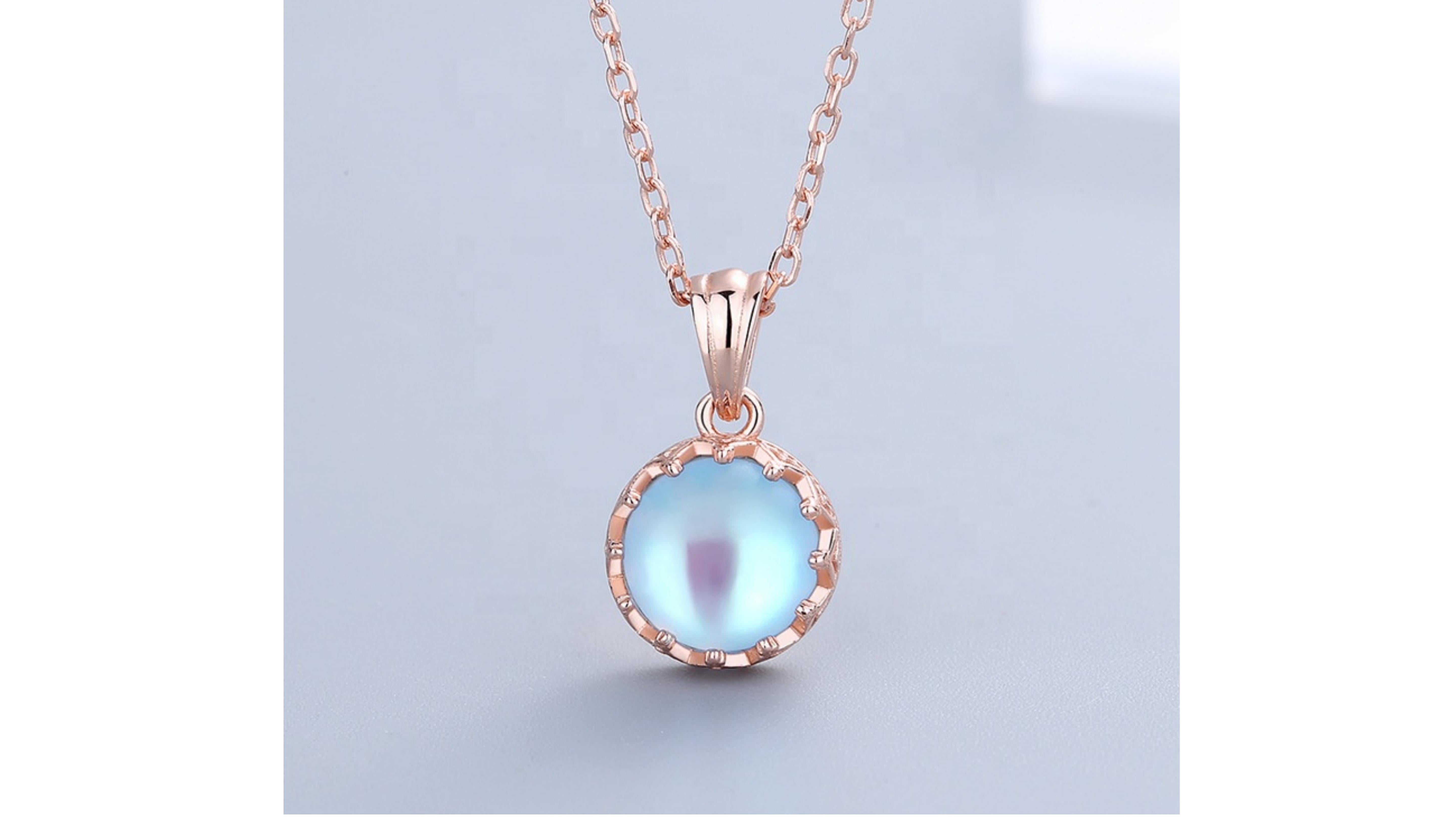 Moonstone Necklaces with accent stones set in Rose Gold Plated  with a option of Sterling Silver .

Its story begins in ancient Rome, where it was believed moonstone was formed from solidified beams of moonlight. They also held that the Roman