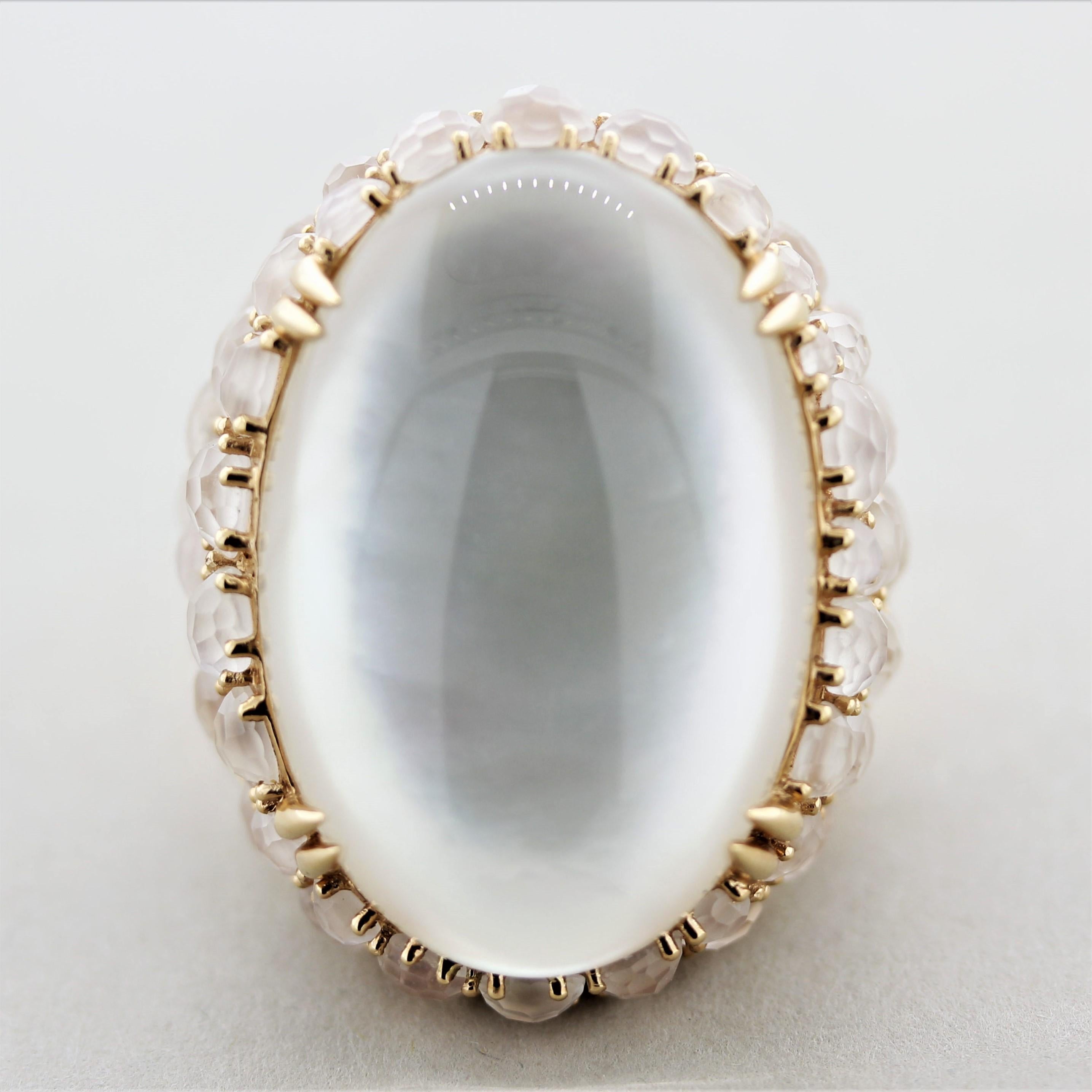 Moonstone Rock-Crystal Mother-of-Pearl Gold Cocktail Ring

A large and impressive cocktail ring with unique gems with special phenomena! It features a large smooth cabochon rock-crystal quartz which is set over a flat piece of mother-of-pearl giving