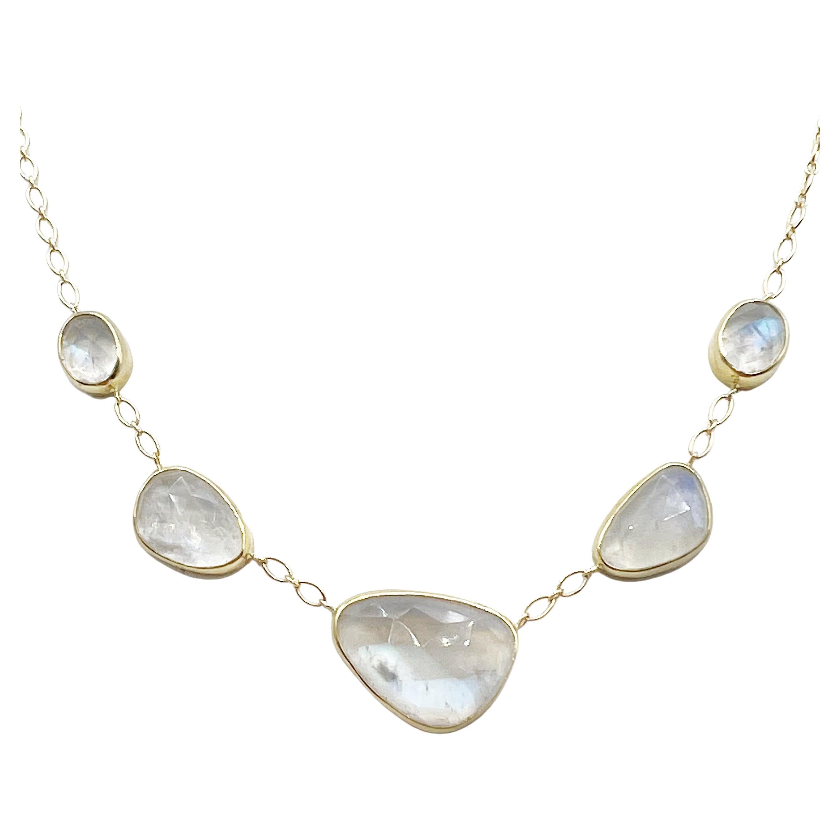 These beautiful watery rose cut moonstones are graduated and bezel set in 14 karat gold with interlocking chain for a elegant and modern look. This necklace is reminiscent of days gone by....