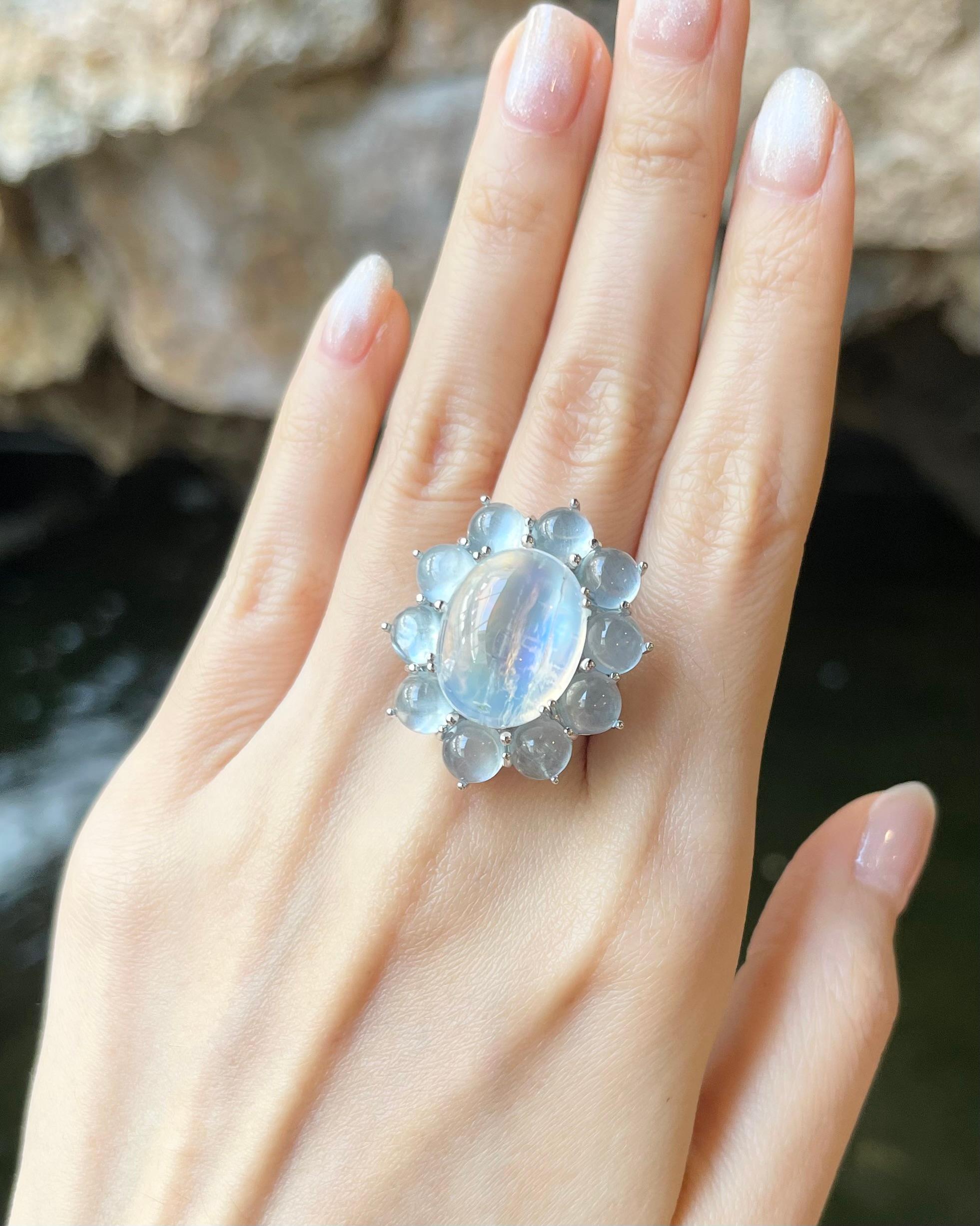 Moonstone 14.98 carats with Cabochon Aquamarine 8.91 carats Ring set in 14K White Gold Settings

Width:  2.5 cm 
Length: 2.9 cm
Ring Size: 56
Total Weight: 17.5 grams


