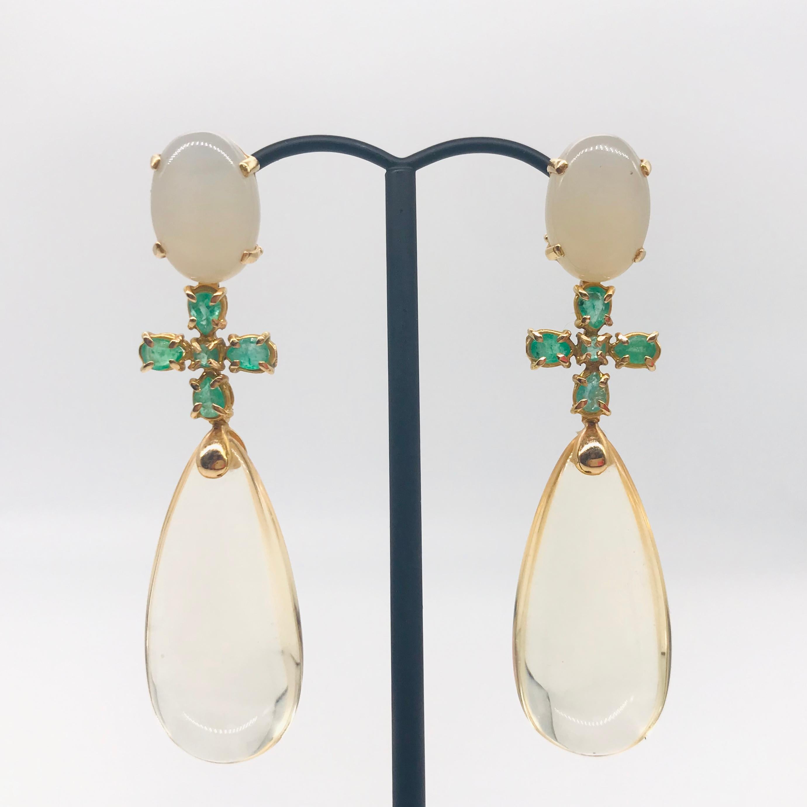 Moonstones, Hydro citrine and Emeralds on Yellow gold 18 k Chandelier Earrings 
2 Moonstones 
2 Hydro Citrine 
10 Emeralds 
Yellow Gold 18 k  weight of gold 5 Grams 
2 type of Clasp (clip and pic) 
Weight of Earrings / 19.20 grams
