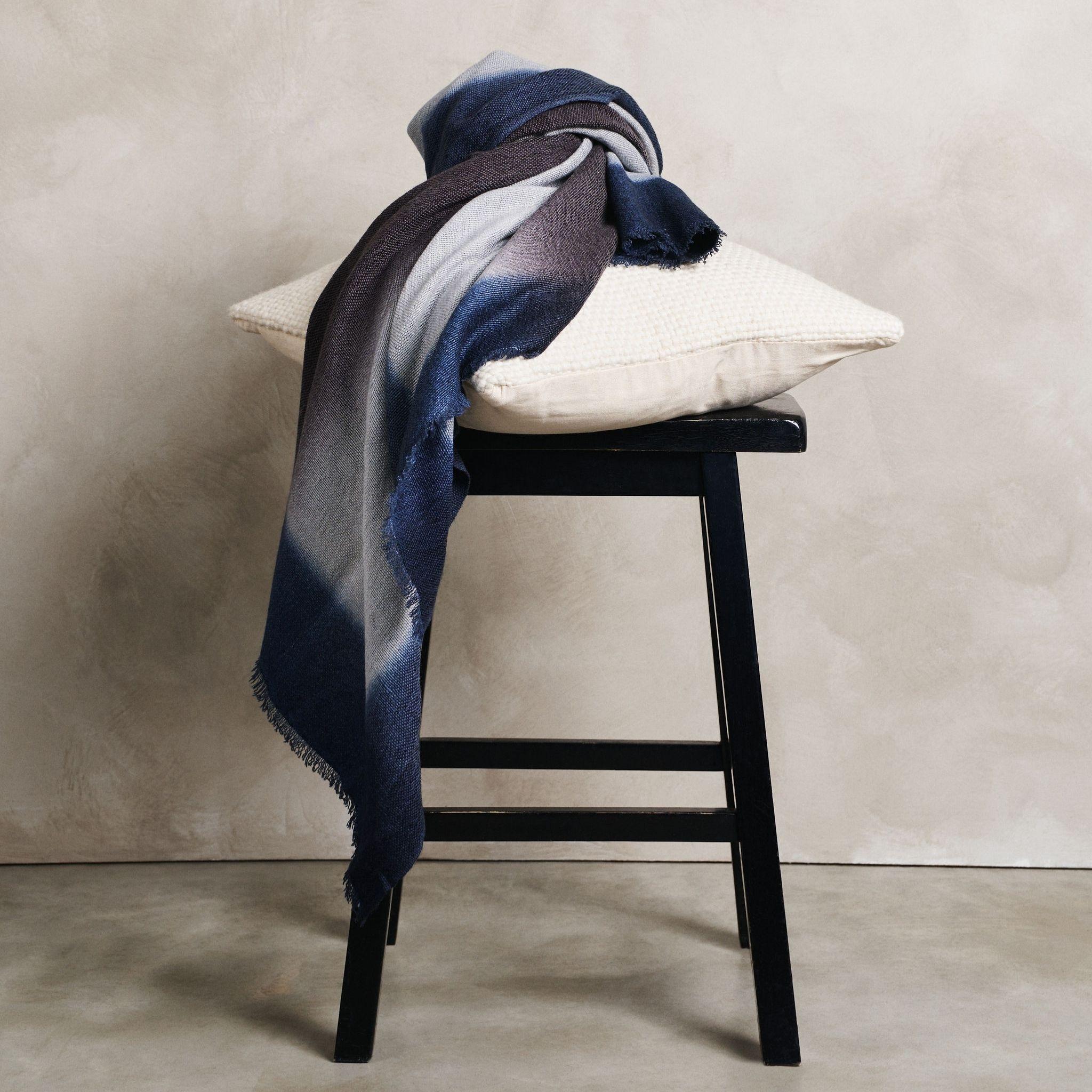 Moonstruck handloom merino  throw / blanket is handwoven by master weavers in Nepal and dip dyed entirely with certified Eco-friendly Swiss Dyes.

Each piece is individually dip dyed entirely using earth-friendly dyes. The design is comprised of