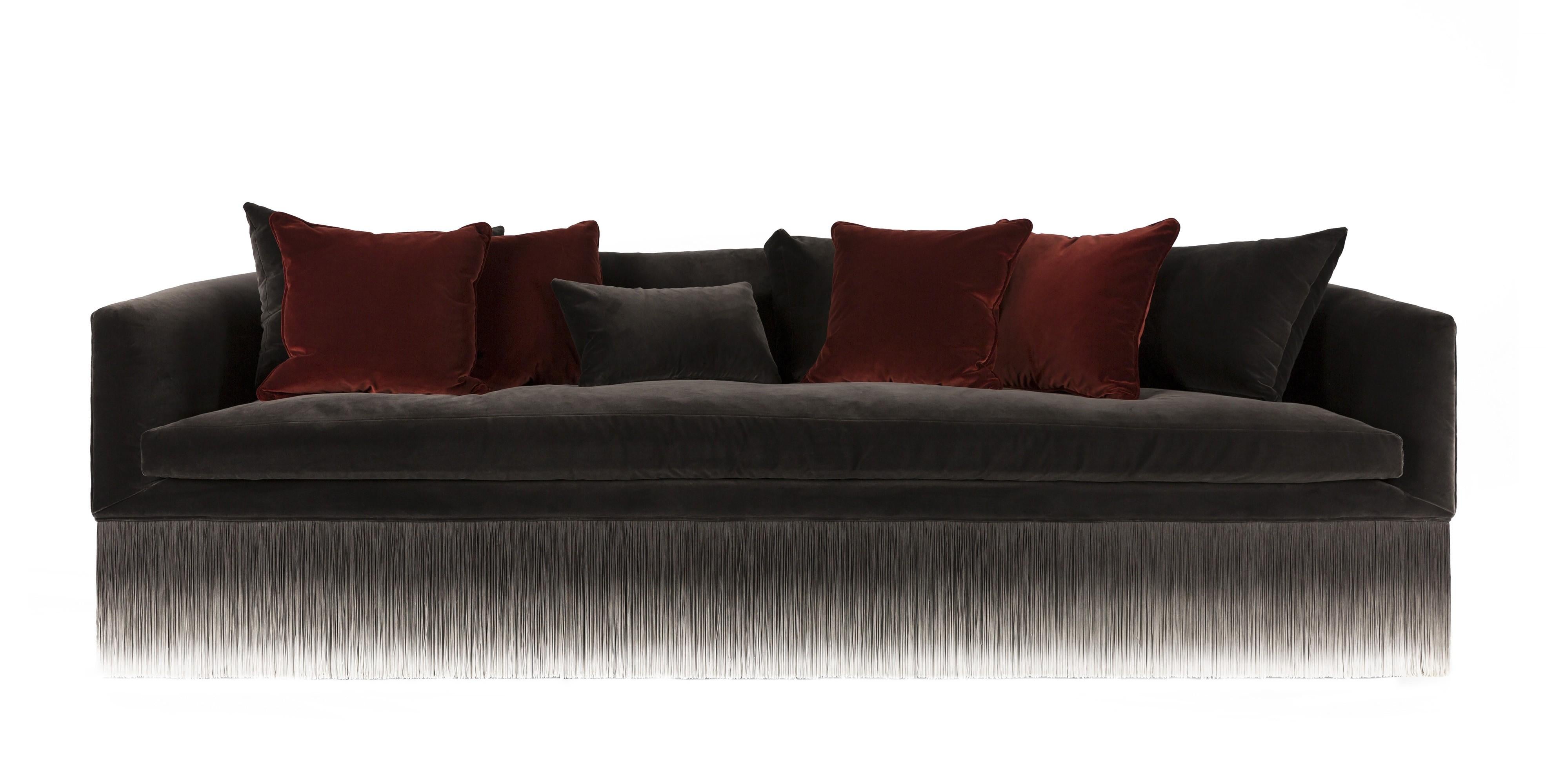 An elegant and comfortable sofa dressed in heart-warming velvet, softly floating on long sensuous fringes that decorate and enhance it, producing a fresh breeze of lightness all around the room: this is For You by Lorenza Bozzoli.

Size: 98.4