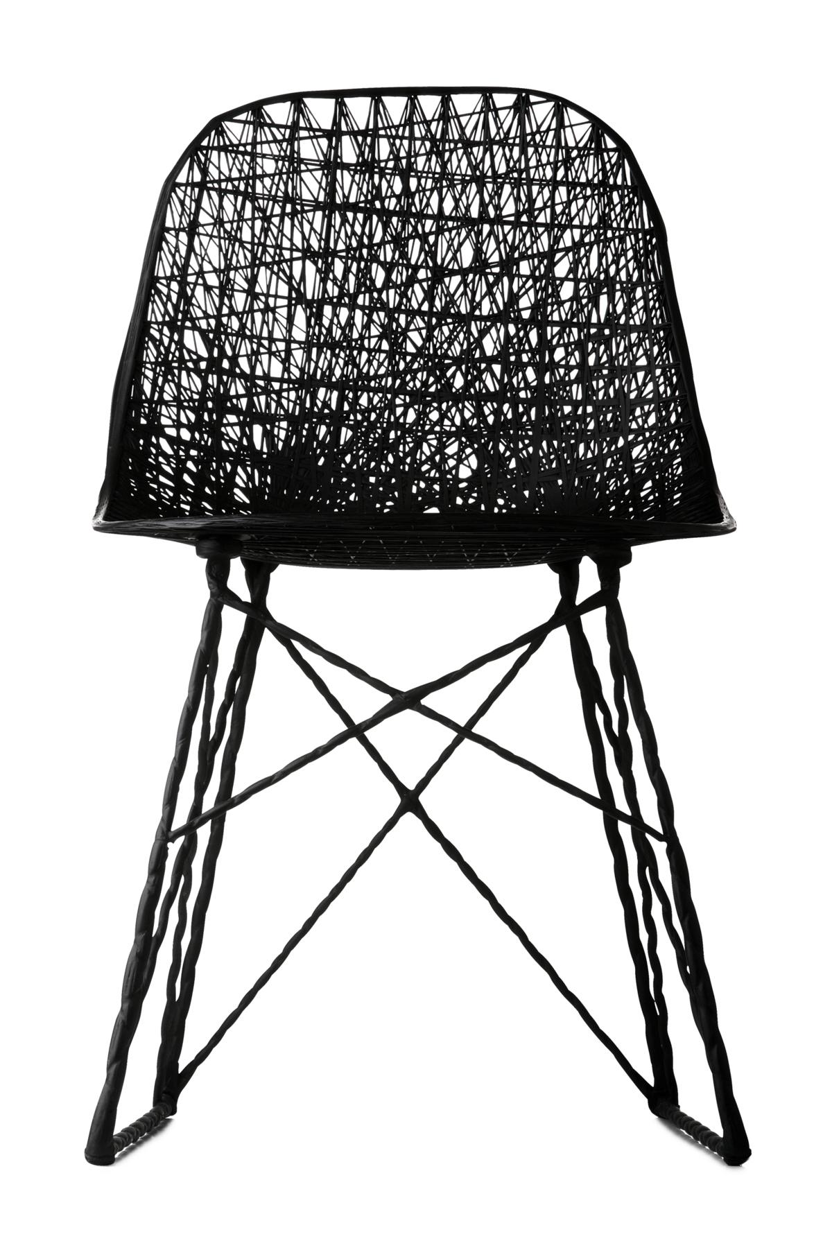 The Carbon Chair of Bertjan Pot and Marcel Wanders speaks of dedicated craftsmanship in connection to high tech materials only made possible by personal excitement, passion and enlightment. The Carbon Bar Stool is made of epoxy resin and carbon