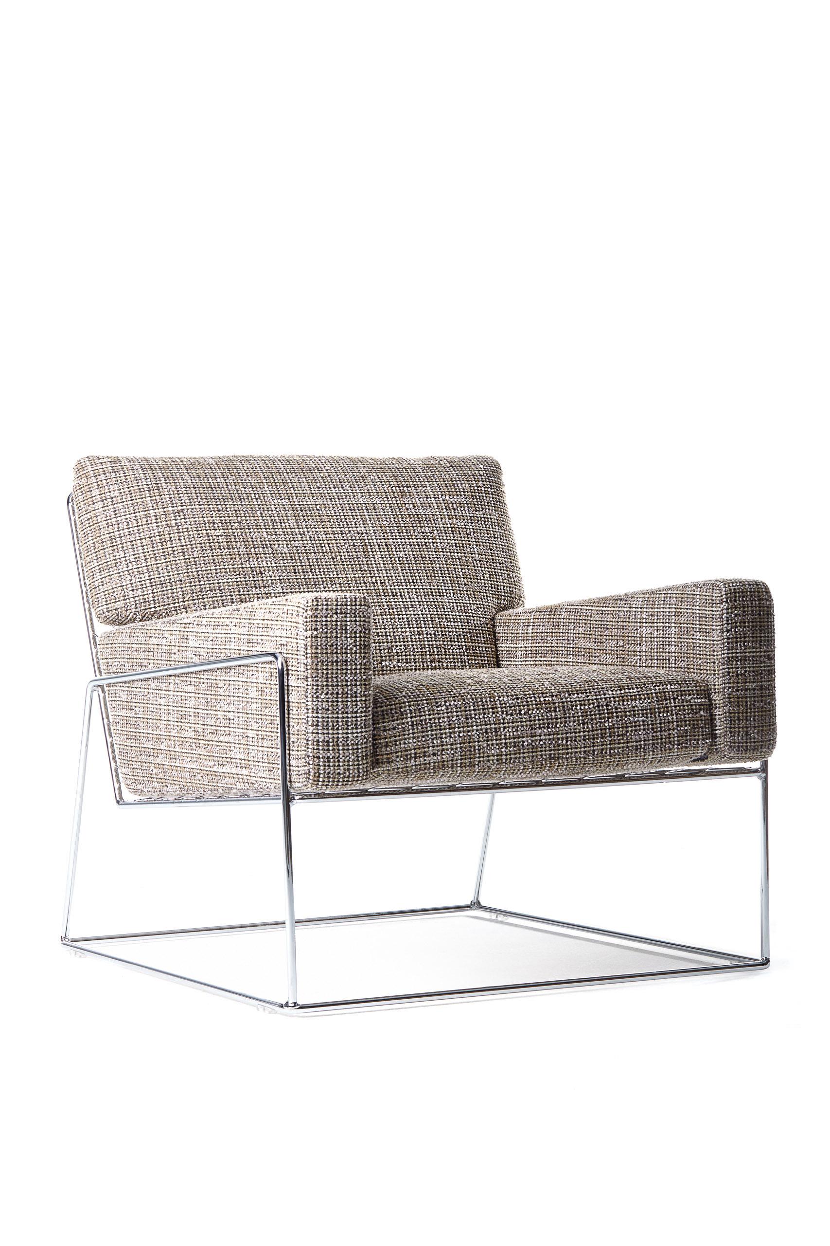 Light and elegant, soft and comfy, the Charles Chair by Marcel Wanders is a triumph of geometrical forms that interact to create a harmonious silhouette, in which the seat is marginally tilted backward by the long-legged frame. This slightly
