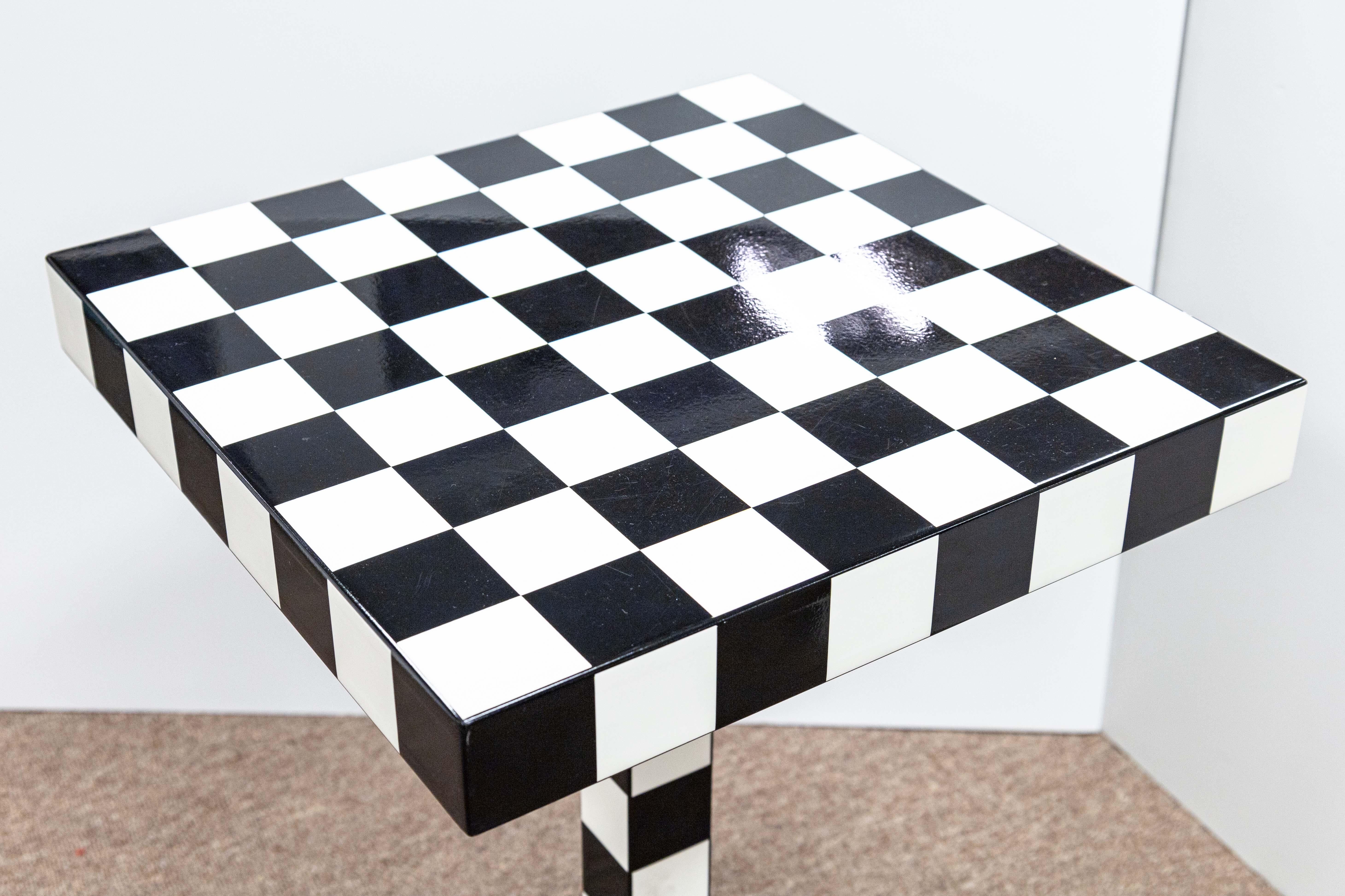 A Moooi chess side table designed by Front. This is a gorgeous side table made by Dutch company Moooi. This piece features a unique checkered design, for style and function. The table top features 64 square checkered blocks, the exact amount needed