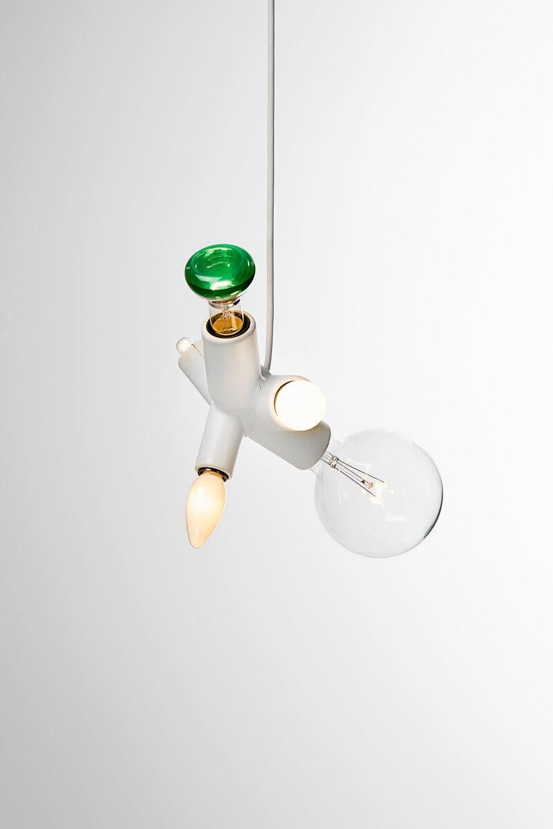 Joel Degemark’s cluster lamp is not just a fun eye-catcher that lights up your home. The fun begins before you put it in place. The cluster lamp comes without light sources, meaning you can get creative and design a unique lamp that fully suits your