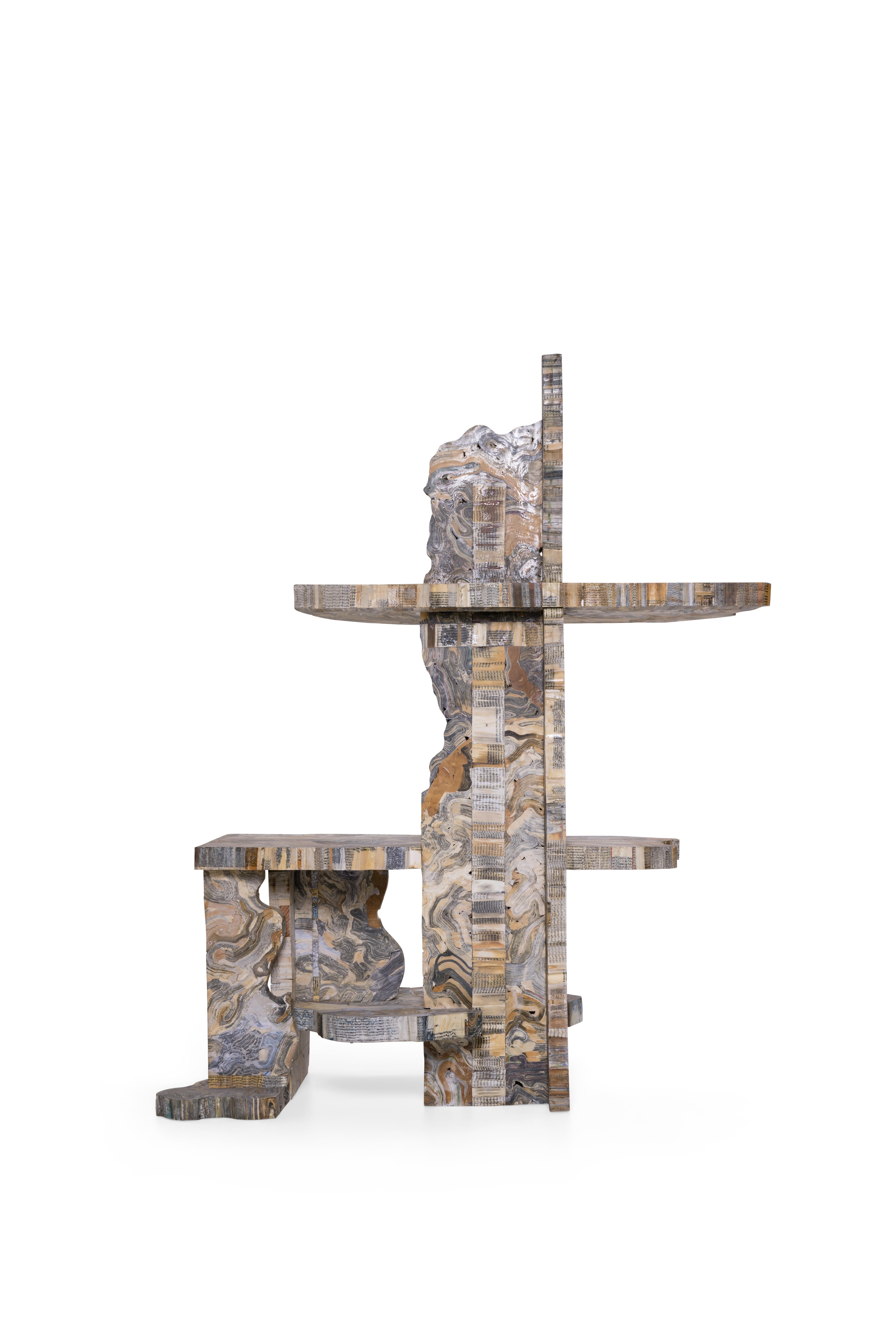 William Zwiers présente Transformed Remnants Bookshelf, une fusion captivante de durabilité et de créativité. Chacune des dix étagères de l'édition est fabriquée à partir de vieux livres réutilisés, méticuleusement trempés dans un mélange d'eau et