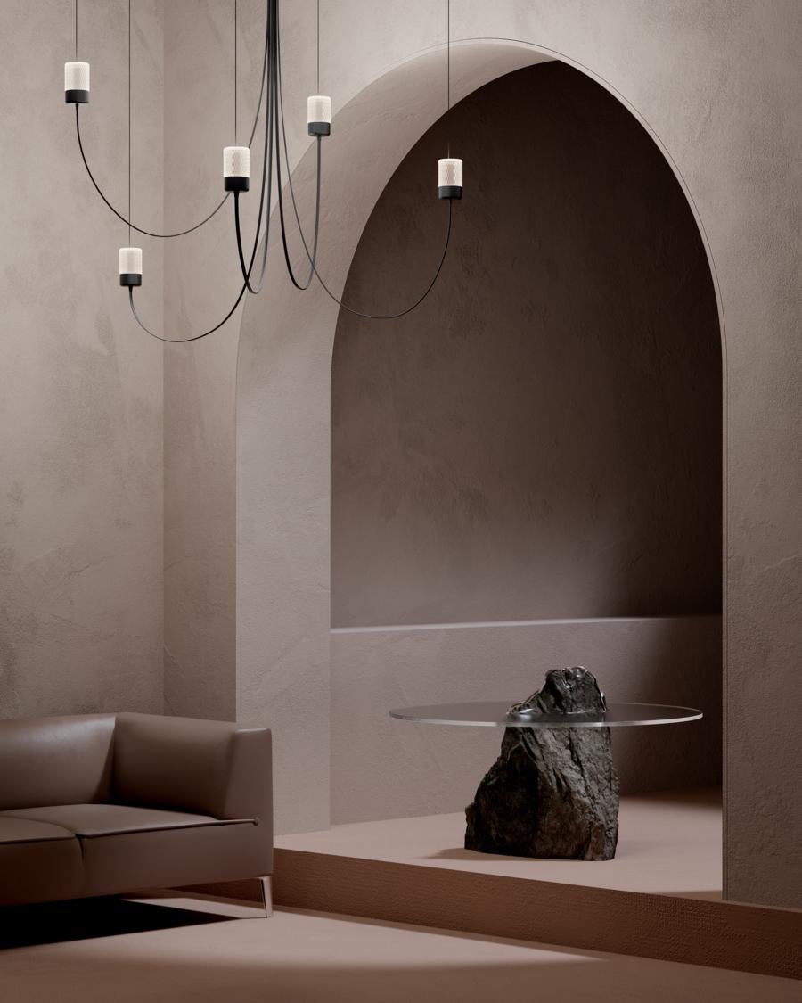 The Gravity chandelier by Paul Cocksedge re-imagines the chandeliers of the past. Inspired by changing rigidity to elasticity. The Gravity Chandelier is the definition of a modern chandelier. At first glance, it doesn’t reveal its flexibility and