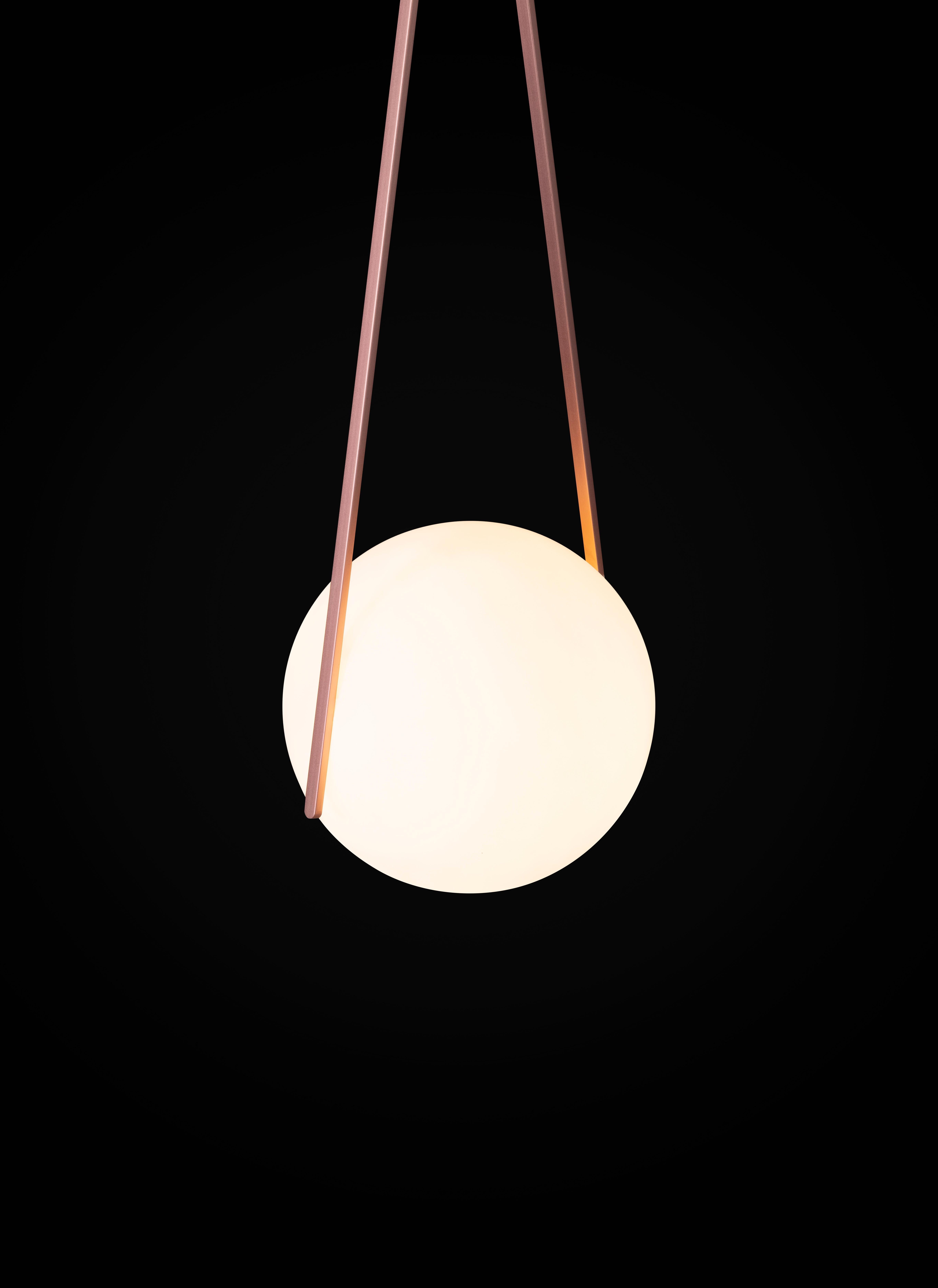 Can. Not. Resist! The NomNom Light by Odin Visser is a contemporary lighting design that puts a smile on your face and a tingle in your belly. This modestly sized suspension light is the perfect example of the art of omission, while remaining