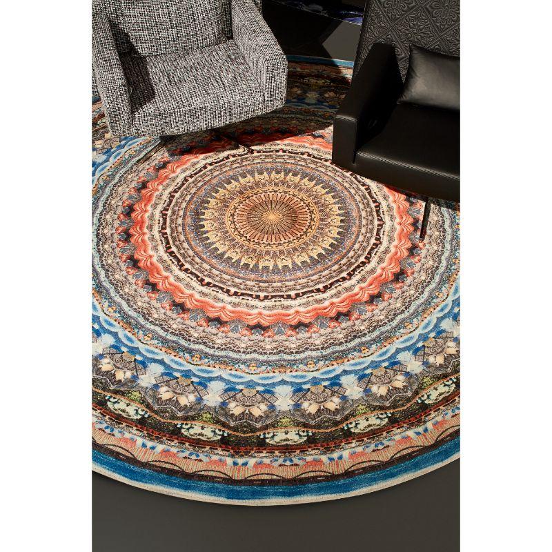 Moooi Small Urban Mandala Chicago rug in Soft Yarn Polyamide by Neal Peterson

Neal Peterson is an American artist based in Minneapolis whose work is influenced by his travels around the globe. In 2016, Peterson began creating large-scale collages