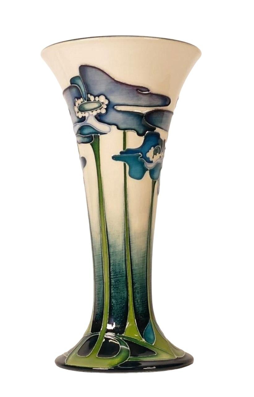 Moorcroft Pottery 'Blue Heaven' vase, TRIAL VASE, dated 04.11.09 This beautiful vase is decorated with the Blue Heaven design by Nicola Slaney. Blue Heaven is an Art Nouveau-inspired design featuring blue poppies.
Signed and marked underside