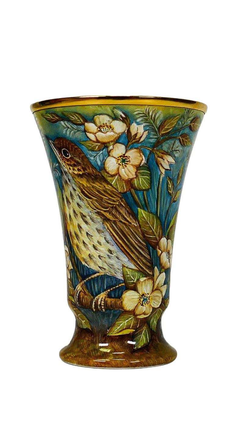 Extremely delicate Vase by Elliot Hall – Ex-Managing Director of Moorcroft Enamels.Sandra Dance Design
Belongs to the Vintage Moorcroft enamel series 2005. Edition 7/35.
Mark at the base.

Size: 3.15 inches

W.Moorcroft PLC acquired Elliot’s family