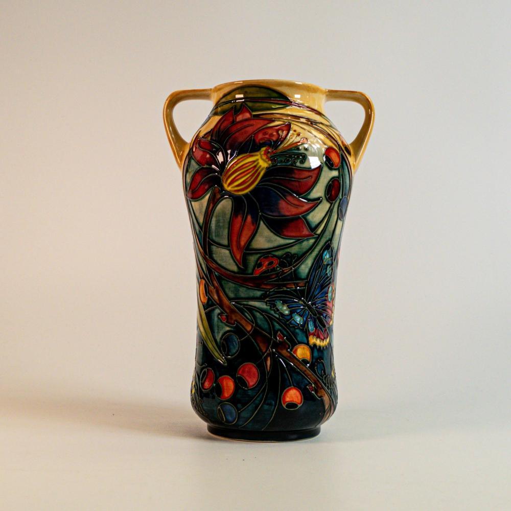 MOORCROFT Art Pottery HARTGRING pattern twin-handled vase. Emma BOOSONS design. 2002

Marvelous Emma Bossons for Moorcroft ‘Hartgring’ twin-handled vase with tube-lined decorated with insects on a green and beige, dated 2002.Shape 375/10
Impressed