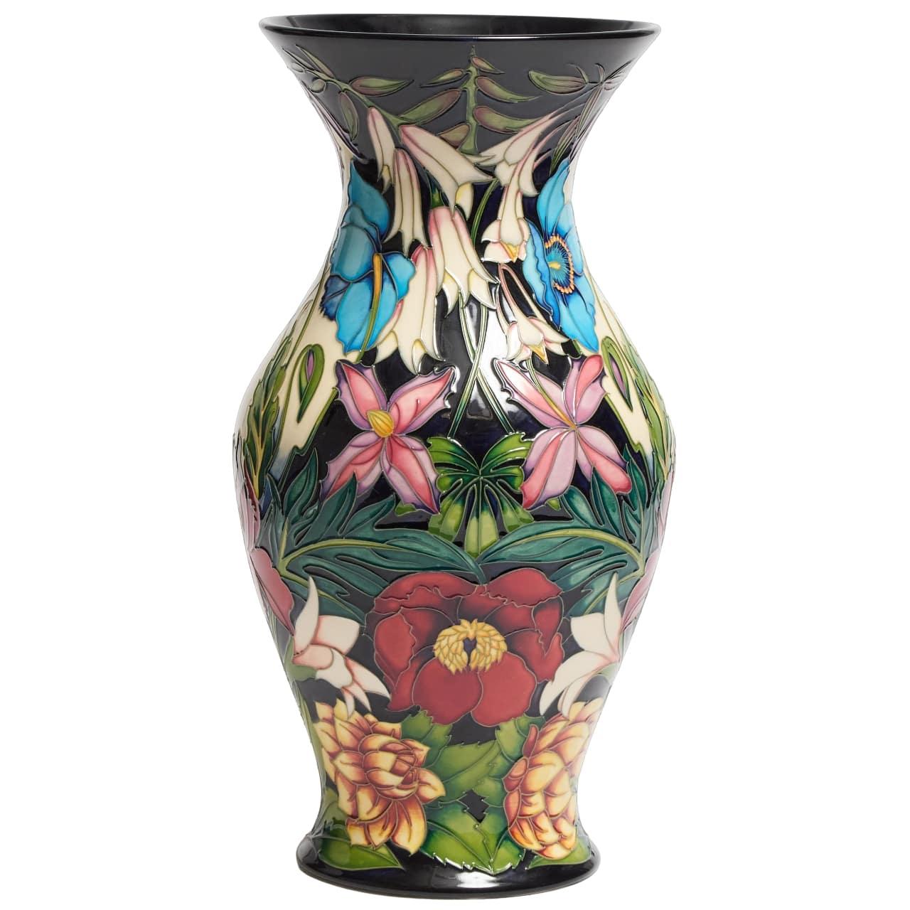 A large and impressive Moorcroft vase in the 'Hidcote Manor' pattern designed by Philip Gibson in 2004, a limited edition numbered 15/75.
Signed to the base, with impressed and painted factory marks
46cm high
Good condition