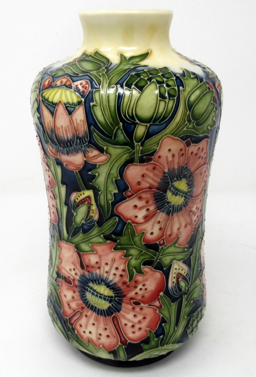 Superb hand painted Art Pottery Moorcroft large flower vase of slightly waisted outline and narrow circular opening. Made in stoke-in-Trent, England. Decorated in the “Pheasants Eye” Pattern by premier Moorcroft Artist Shirley Hayes.

The outed