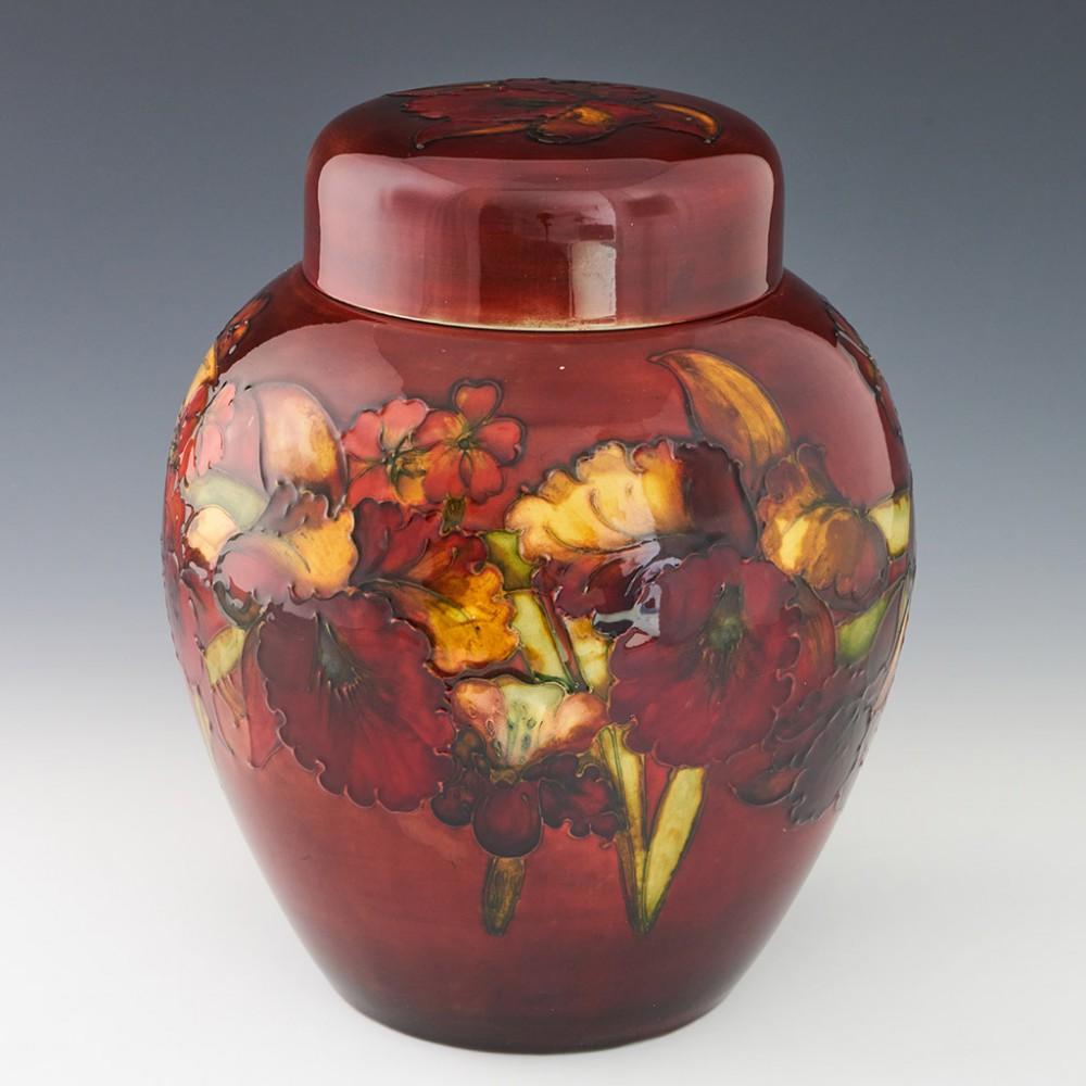 Moorcroft Pottery Large Flambe Orchid Ginger Jar, c1955

Additional Information:
Heading : Moorcroft Pottery Large Flambe Orchid Ginger Jar 
Date : c1955
Origin : Burslem, Staffordshire
Bowl Features : Flambe background with rich autmnal palette for