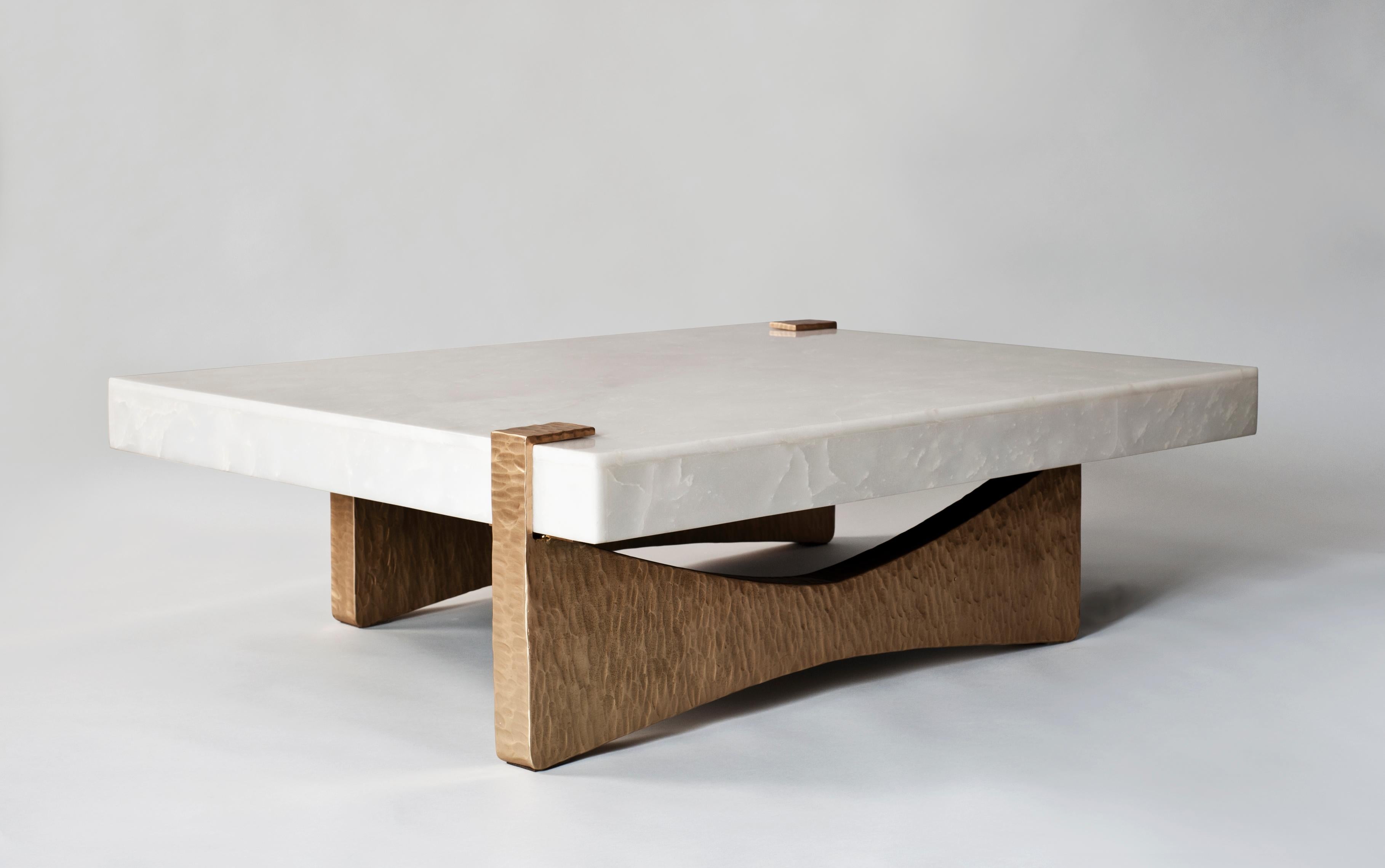Moore coffee table by DeMuro Das 
Dimensions: W 167 x D 100 x H 37 cm
Materials: White onyx - Polished (Slap)

Dimensions and finishes can be customized.

DeMuro Das is an international design firm and the aesthetic and cultural coalescence of