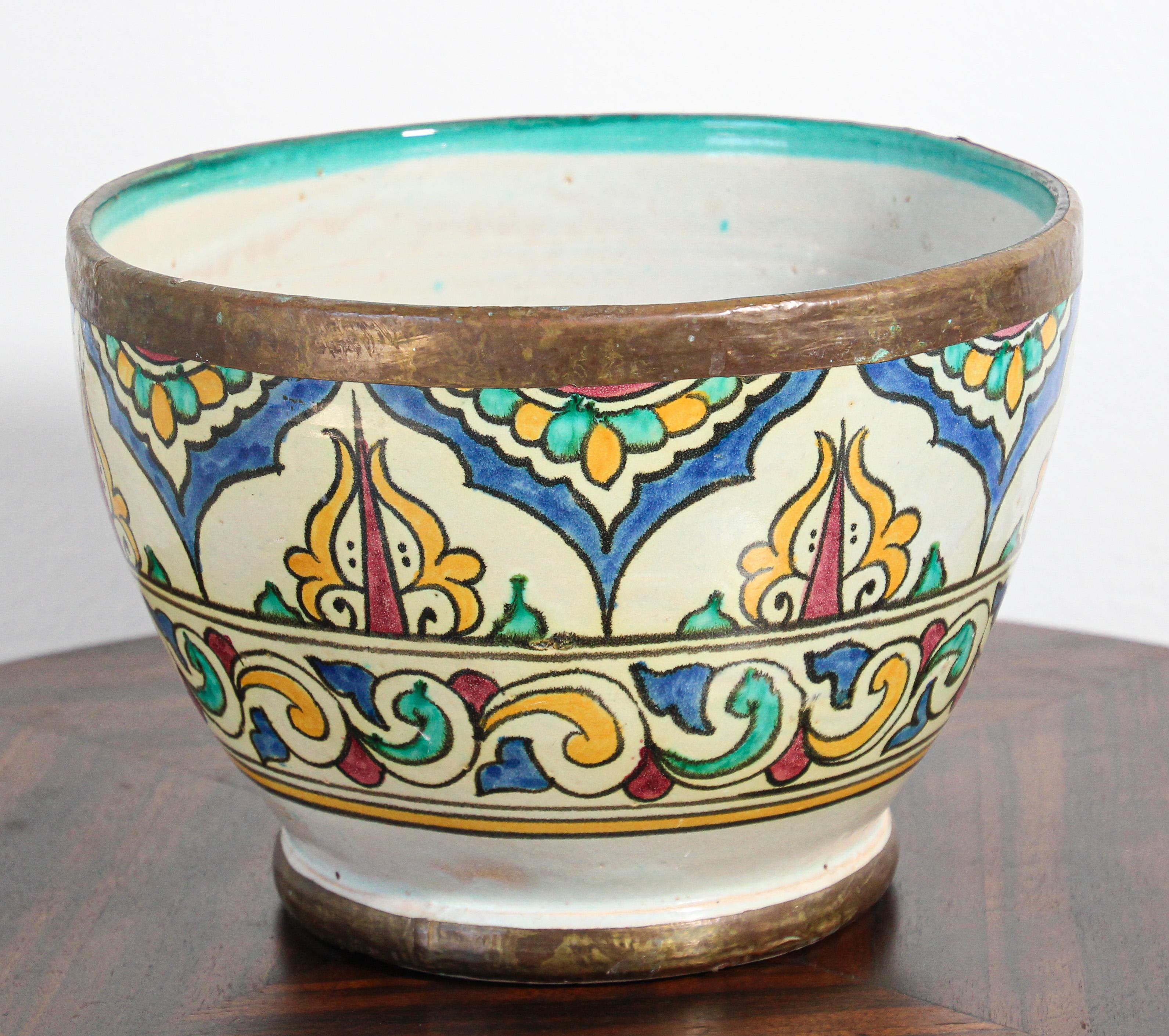 Antique large Moroccan handcrafted glazed polychrome ceramic bowl.
Moroccan, Fez or Meknes bowl Jobbana with geometric Moorish designs.
Hand painted ceramic Jubbana bowl, handcrafted by skilled Moroccan artisans in Fez Morocco.
Moorish designs in