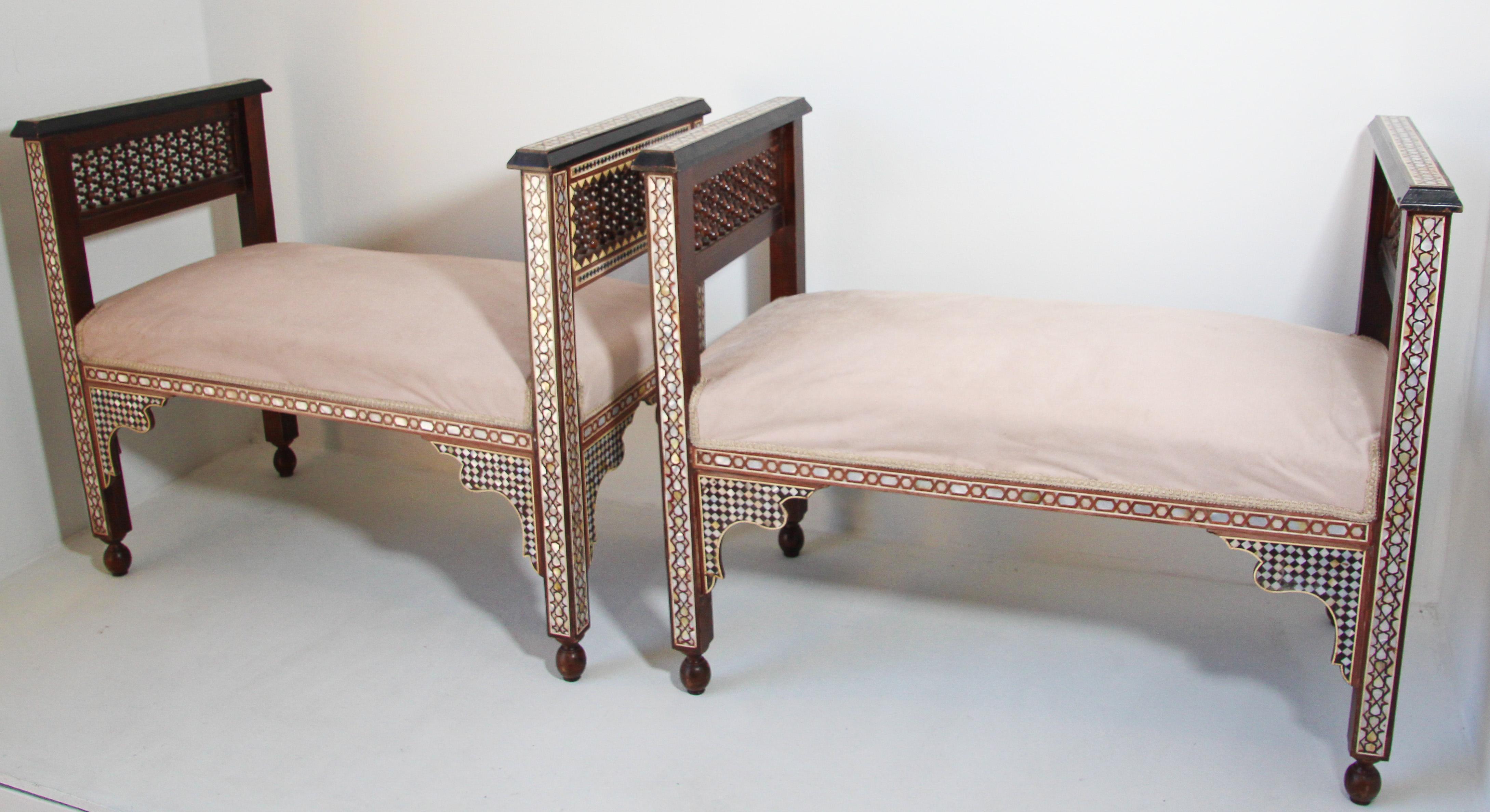 A pair of antique Middle Eastern Moorish Egyptian settees inlaid with mosaic marquetry.
Mosaic inlaid Levantine Moorish benches great to use at the end of the bed or in an entryway.
Elegant and stylish settees for your Moroccan Moorish decor