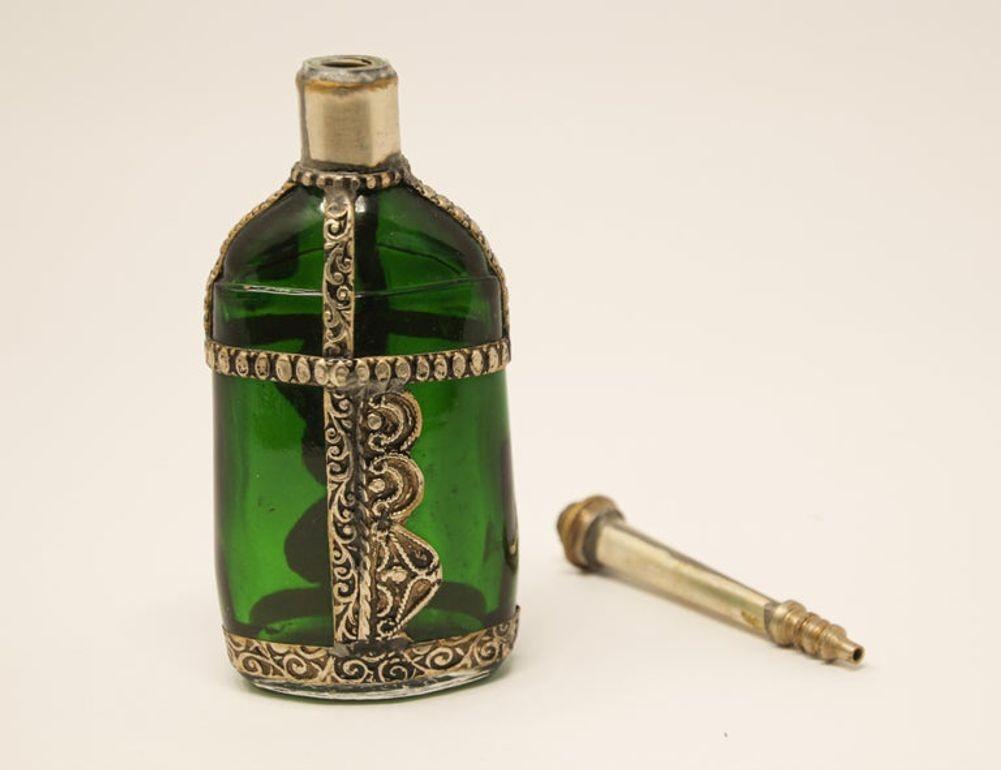 20th Century Moorish Green Glass Perfume Bottle Sprinkler with Embossed Metal Overlay For Sale
