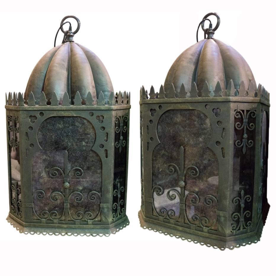 Made of iron and glass these heavy hanging lamps have many alluring details and are available individually or in multiples while in stock, enquirer about lead time for large quantity orders.