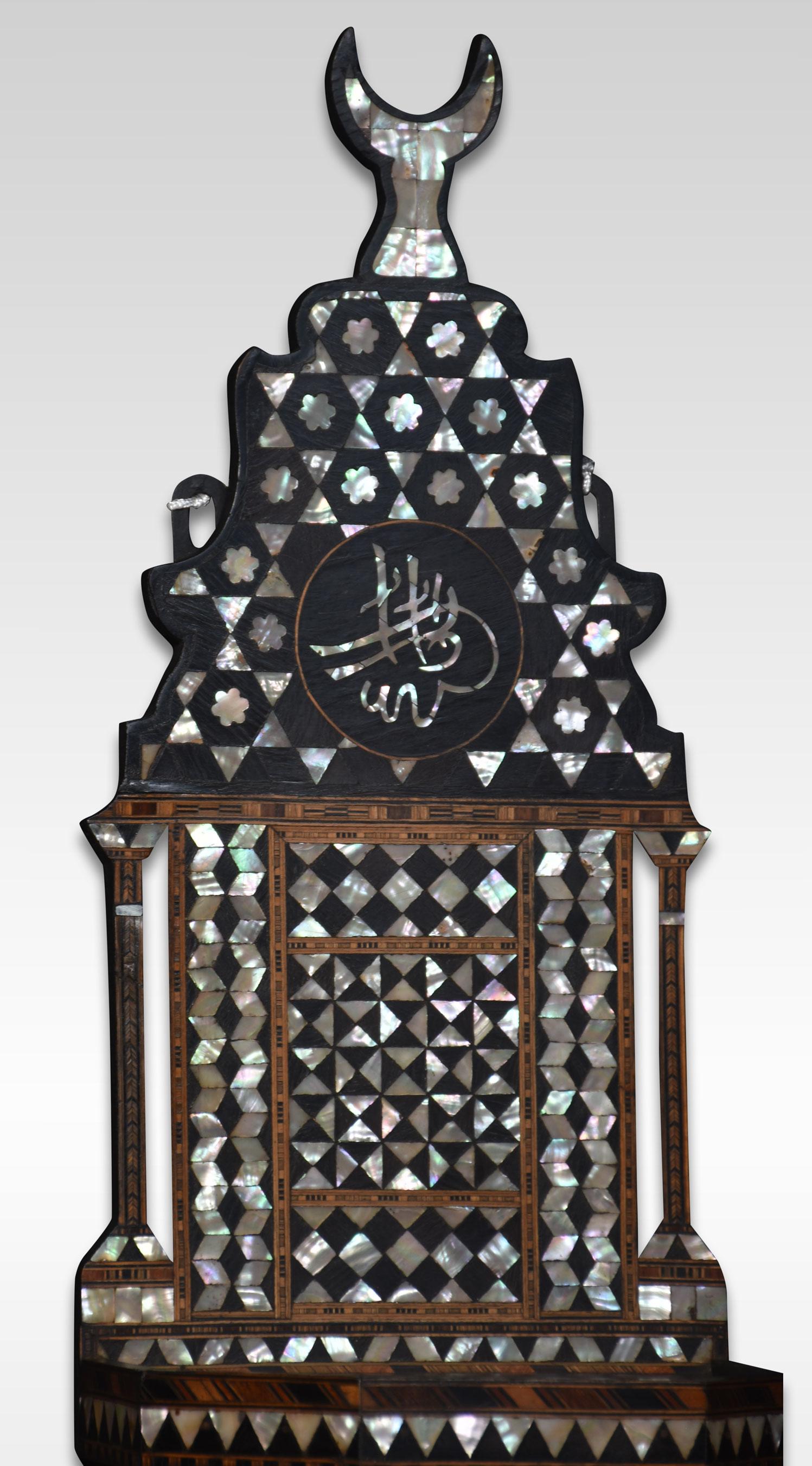 Moorish wall bracket expertly crafted with geometric inlays of mother of pearl, bone, and exotic hardwoods.
Dimensions
Height 24 Inches
Width 8.5 Inches
Depth 6 Inches