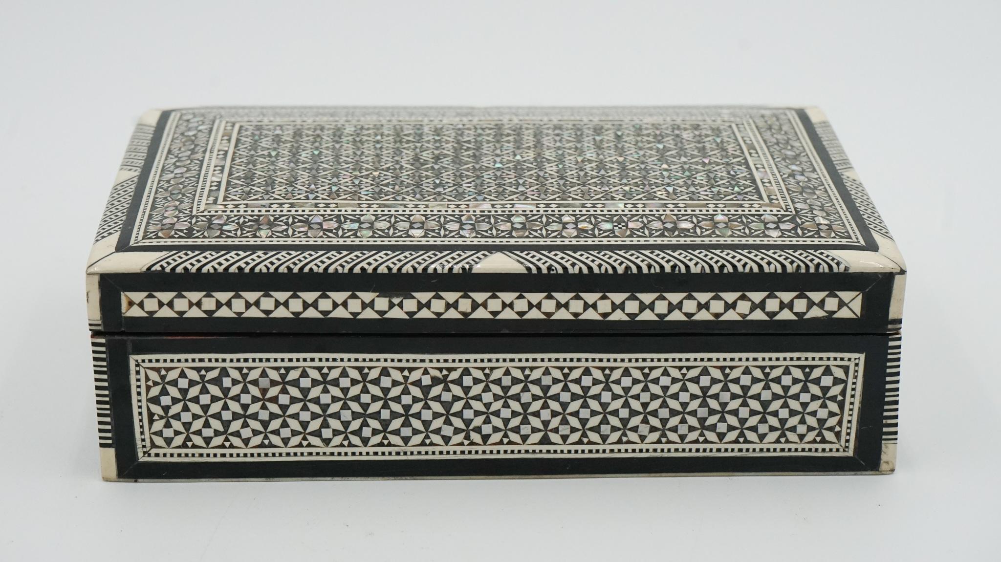 
Antiques of London



We are delighted to offer for sale this Lovely Moorish Micro Mosaic Inlaid Mother Of Pearl Trinket Jewelry Storage Box. 

The Moorish micro mosaic inlaid mother-of-pearl trinket jewellery storage box is a beautifully crafted