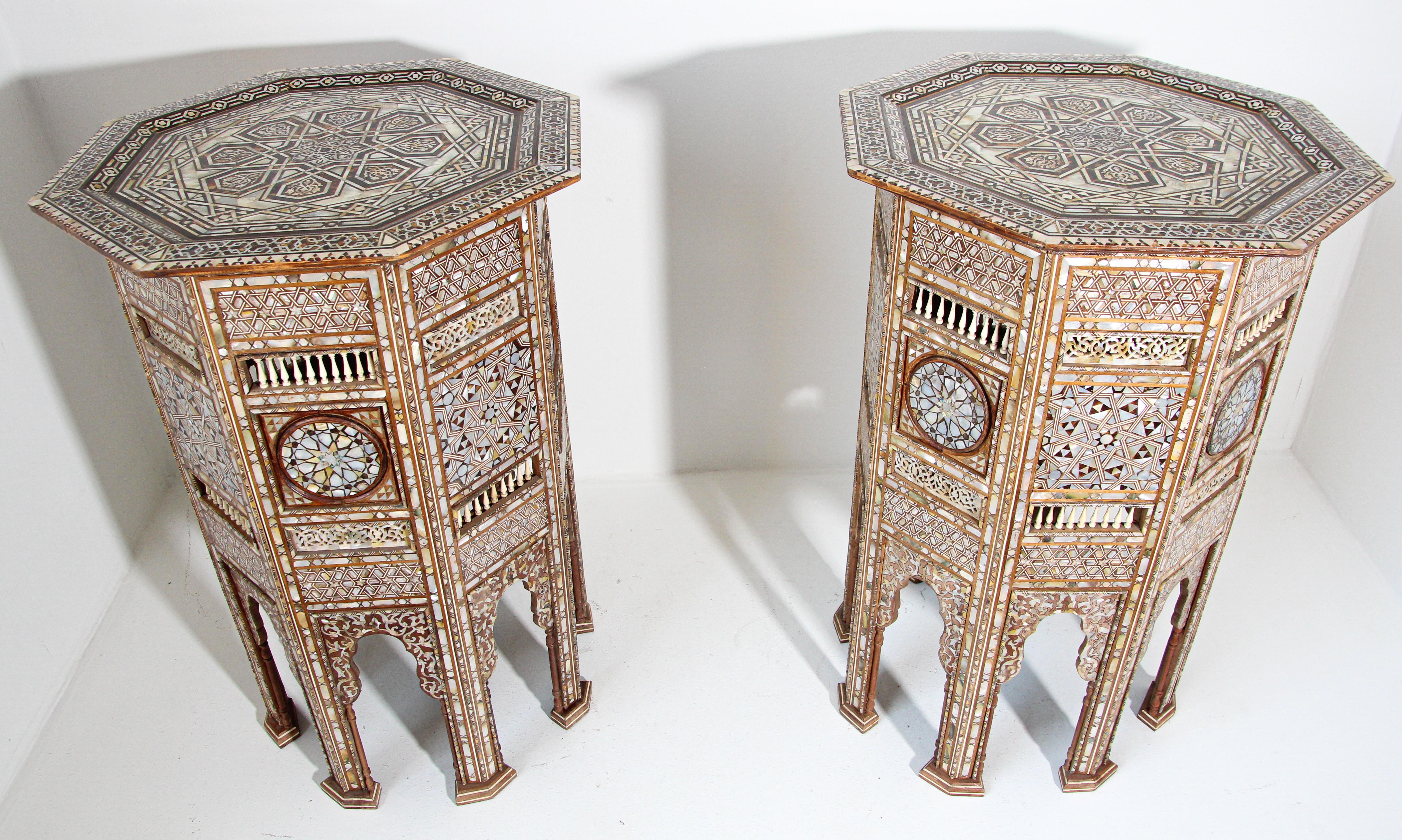 Pair of Moorish Middle Eastern pedestal tables inlaid.
Pair of large antique 19th century Middle Eastern Moorish style mosaic inlay tables.
Outstanding very rare to find pair of Ottoman Turkish pedestal tables inlaid.
Very fine Islamic
