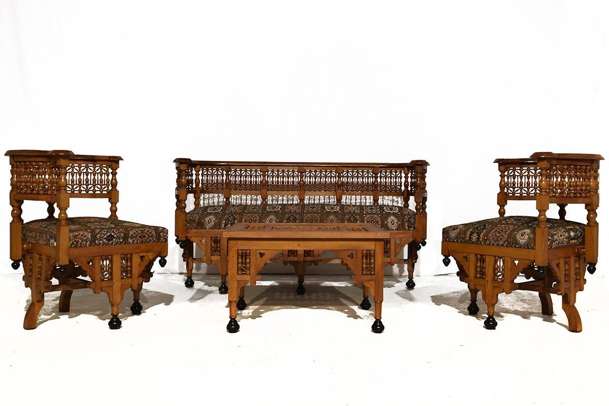 Early 20th century Moorish Moroccan made Lounge set. Including a settee, two easy chairs and a coffee table. Handmade fretwork on the back and side, inlaid with mother-of-pearl. Carlo Bugatti style. 


Settee size: 146 x 58 x 70 cm seating height 40