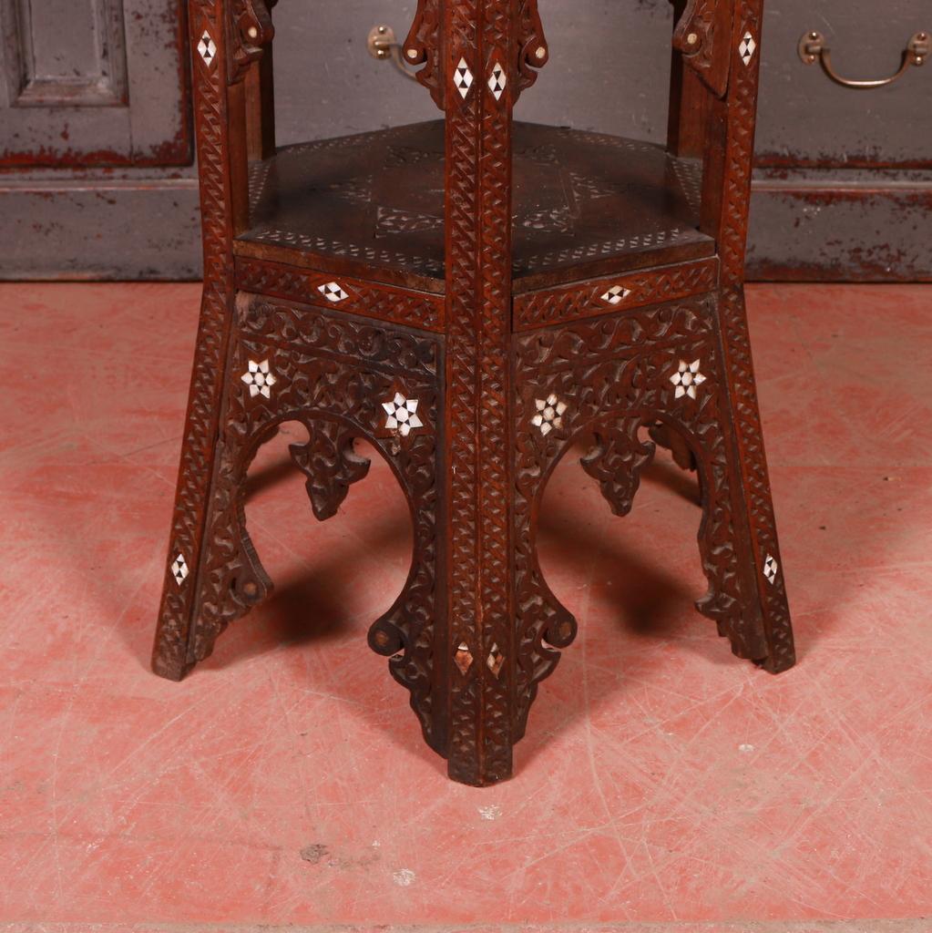 Moorish carved and mother of pearl inlay occasional table, 1890

Dimensions:
21 inches (53 cms) wide
21 inches (53 cms) deep
39.5 inches (100 cms) high.