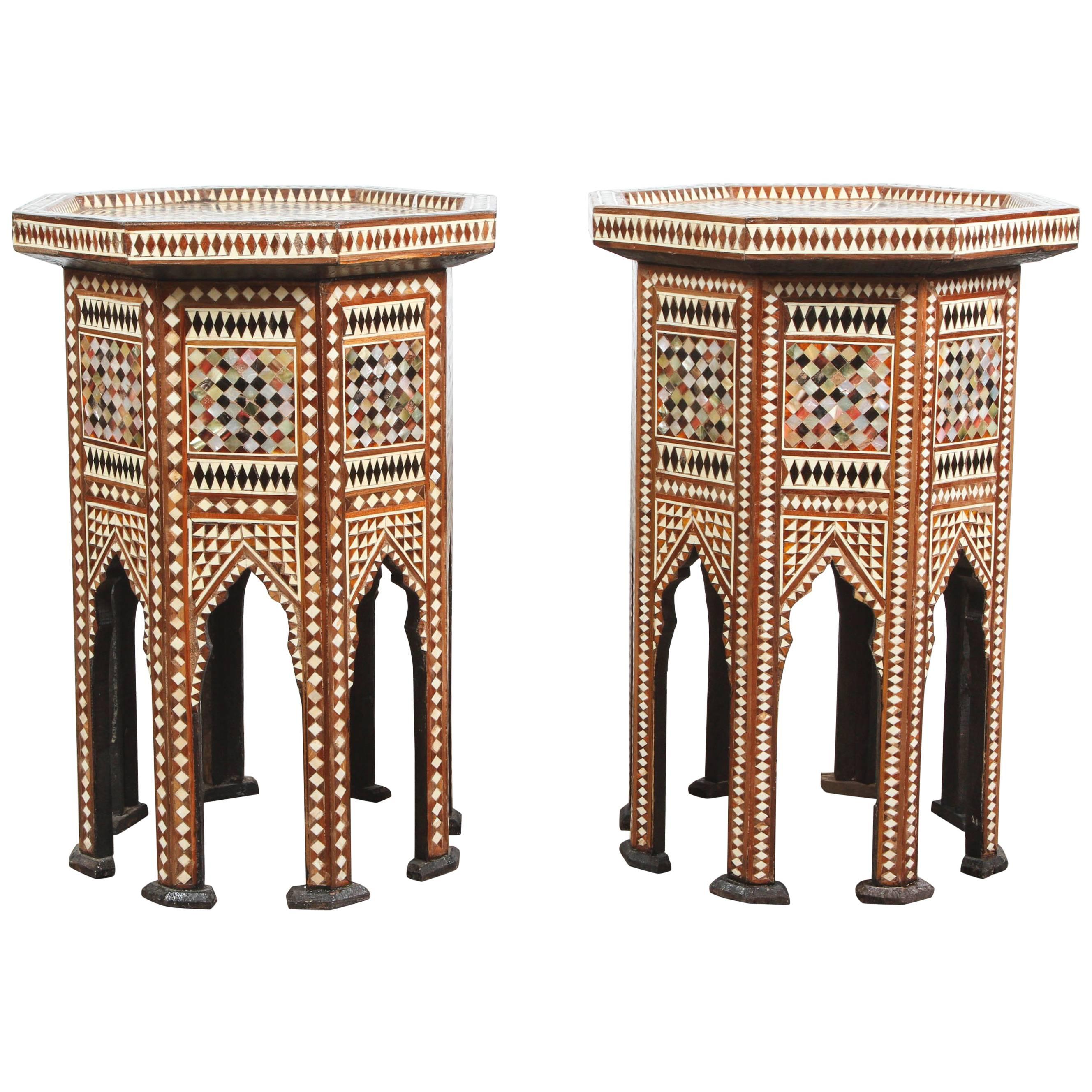 Pair of Moorish octagonal walnut side tables inlaid with mother of pearl, horn, ebony and camel bone.
Moorish arches on the eight sides,
Great addition for a Moroccan room project.
Very intricate inlay Middle Eastern Moorish ottoman artwork.