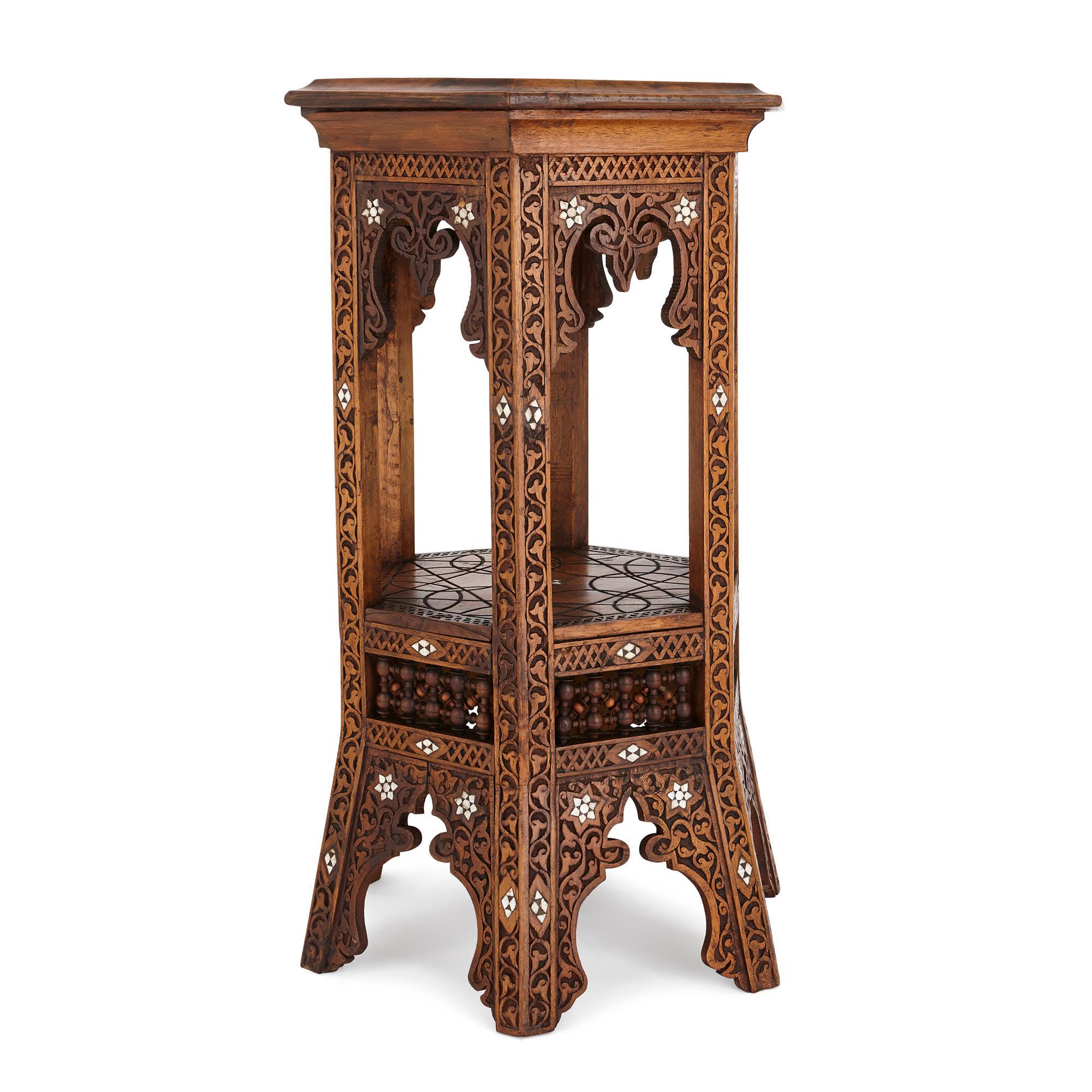 This hardwood side table is a wonderful piece of Indo-Portuguese furniture. The table is designed in a Moorish style, which was a variation of Islamic art. This style flourished in North Africa and parts of Spain and Portugal, which were occupied by