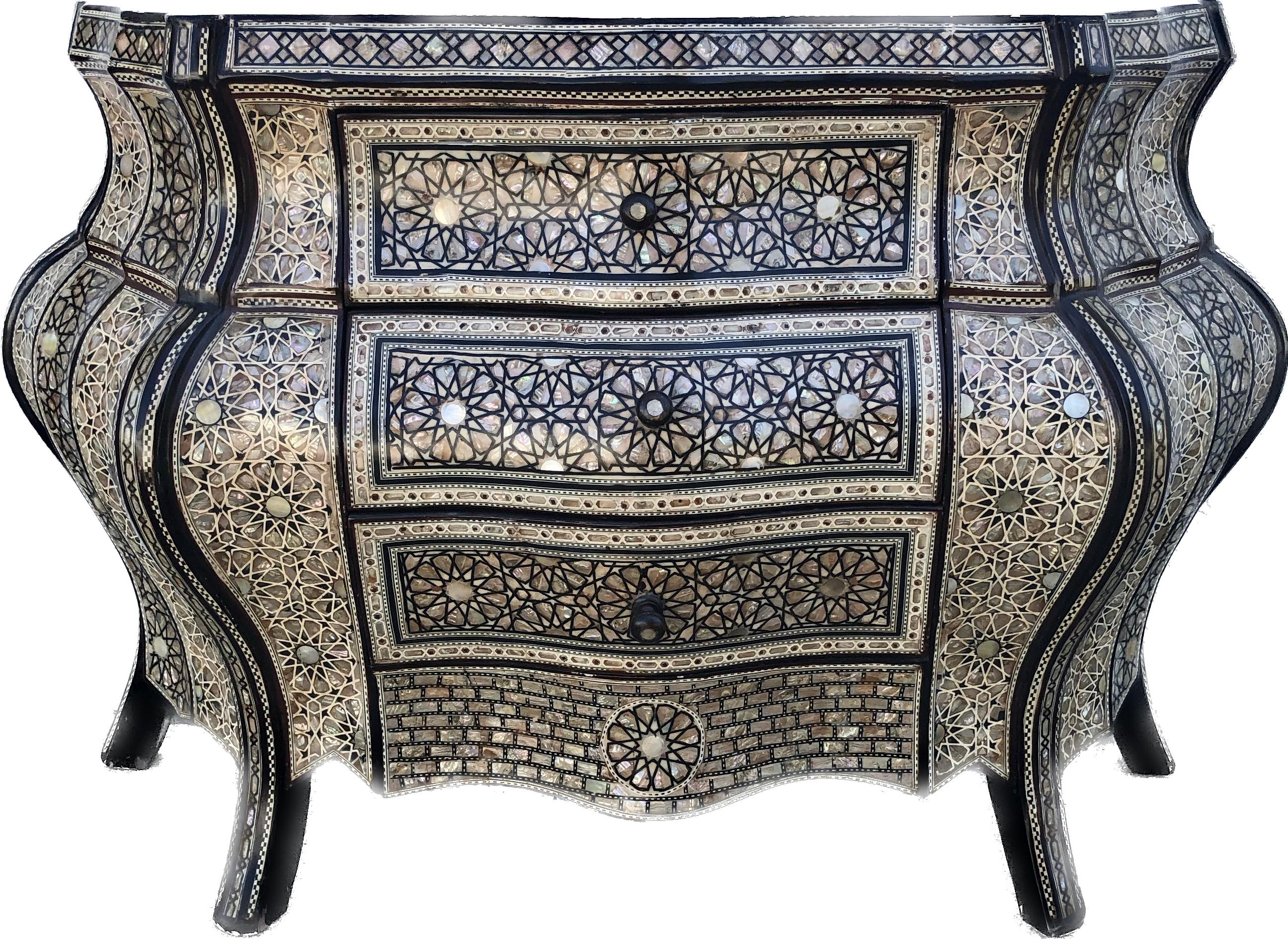 Camel bone and mother of pearl inlaid three drawer commode with ball turned pulls and geometric detail. The double bombe serpentine chest extensively inlaid in a geometric pattern throughout. A rare find.