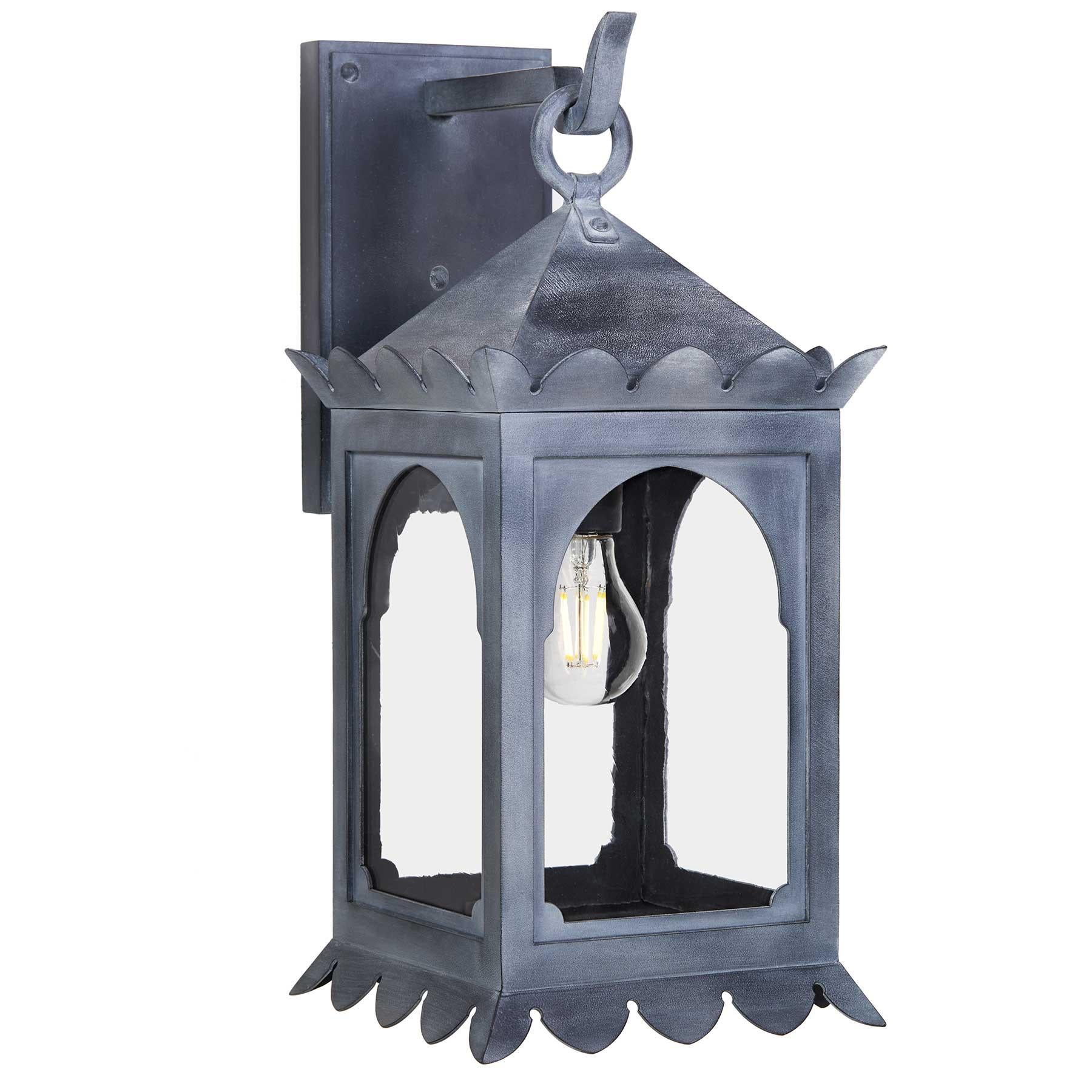 The Zara is a Moorish style exterior light fixture designed to add a touch of exotic elegance to your space. Crafted from heavy gauge steel, this fixture is built to last and radiates a robust aura of strength and durability. The Zinc Finish and