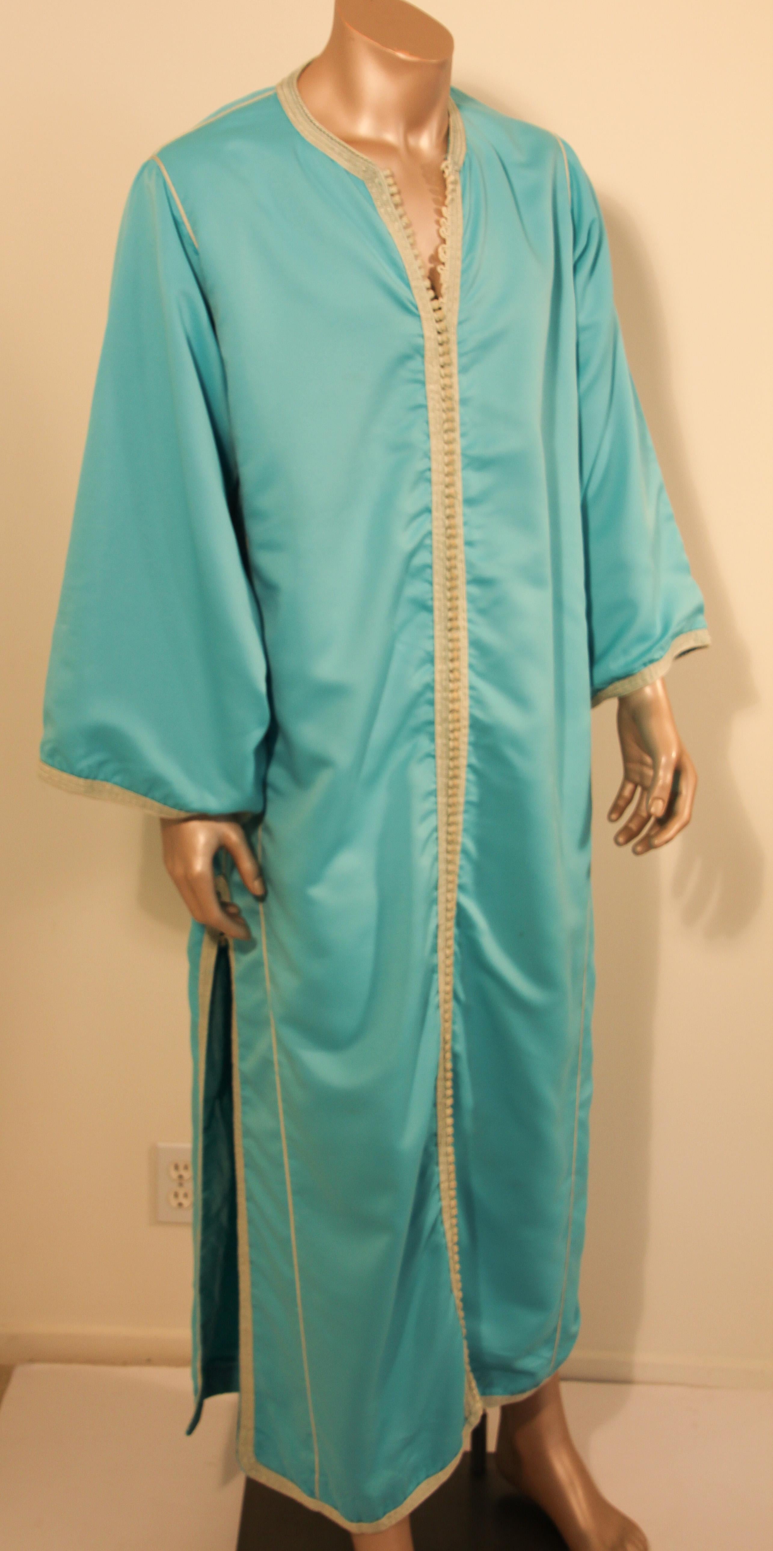 Handmade long maxi dress caftan from North Africa, Morocco.
Vintage 1940s caftan robe.
Maxi dress caftan with running down the center round braided buttons from the neckline to the hemline.
Fully front thread buttoning with hand knotted looped